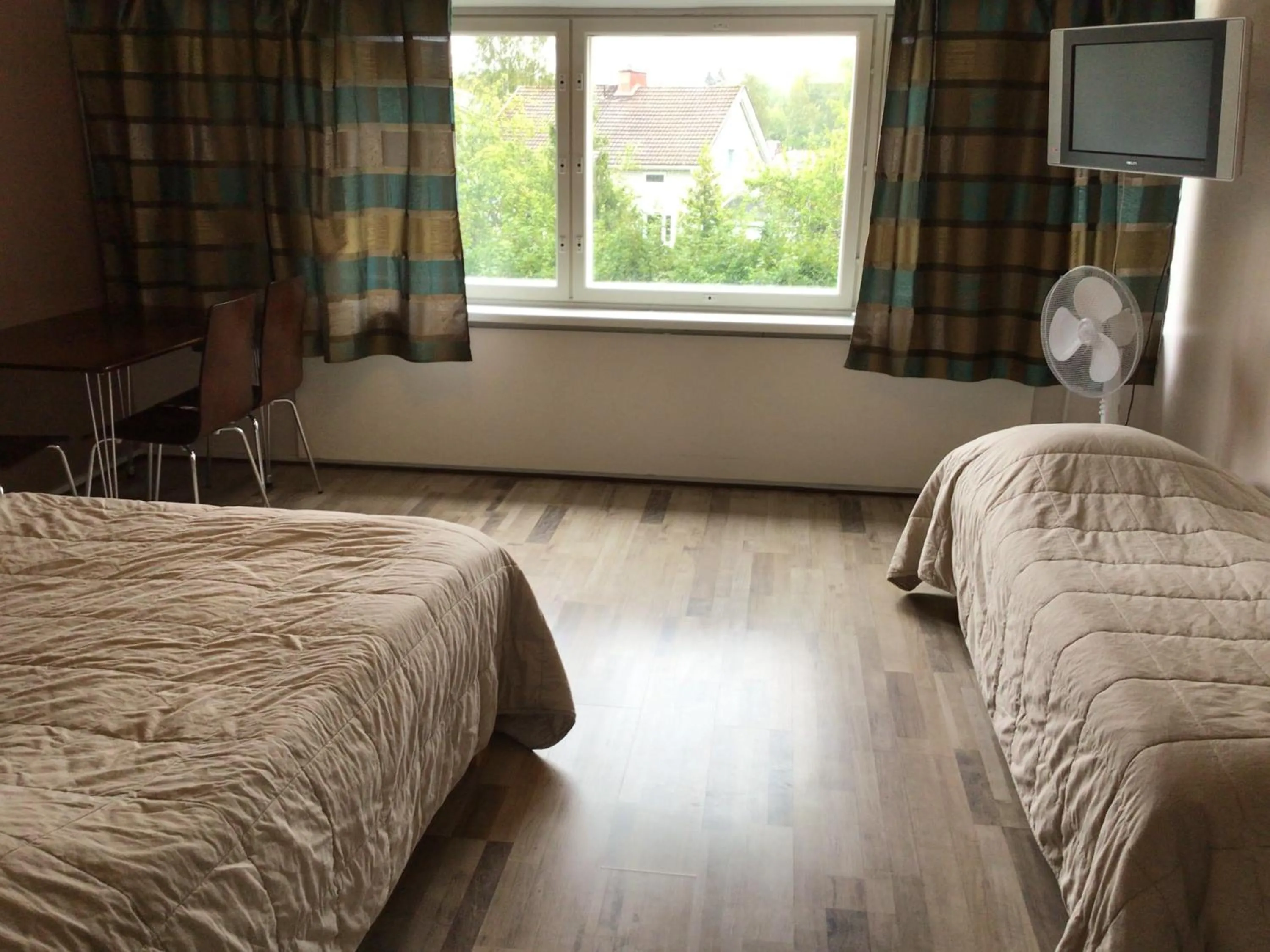 Bed in Leo Hotelli