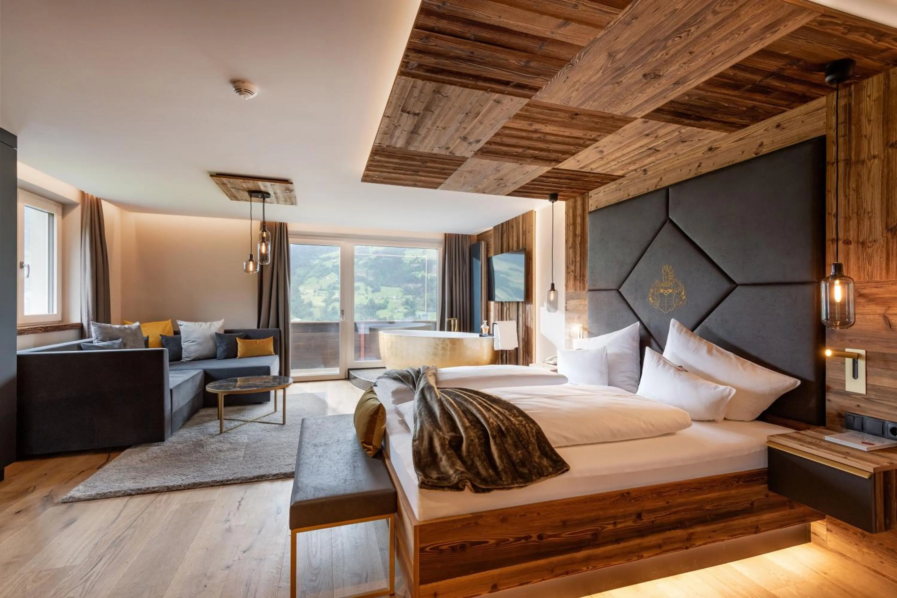 Photo of the whole room, Bed in Hotel Waldfriede - Der Logenplatz im Zillertal