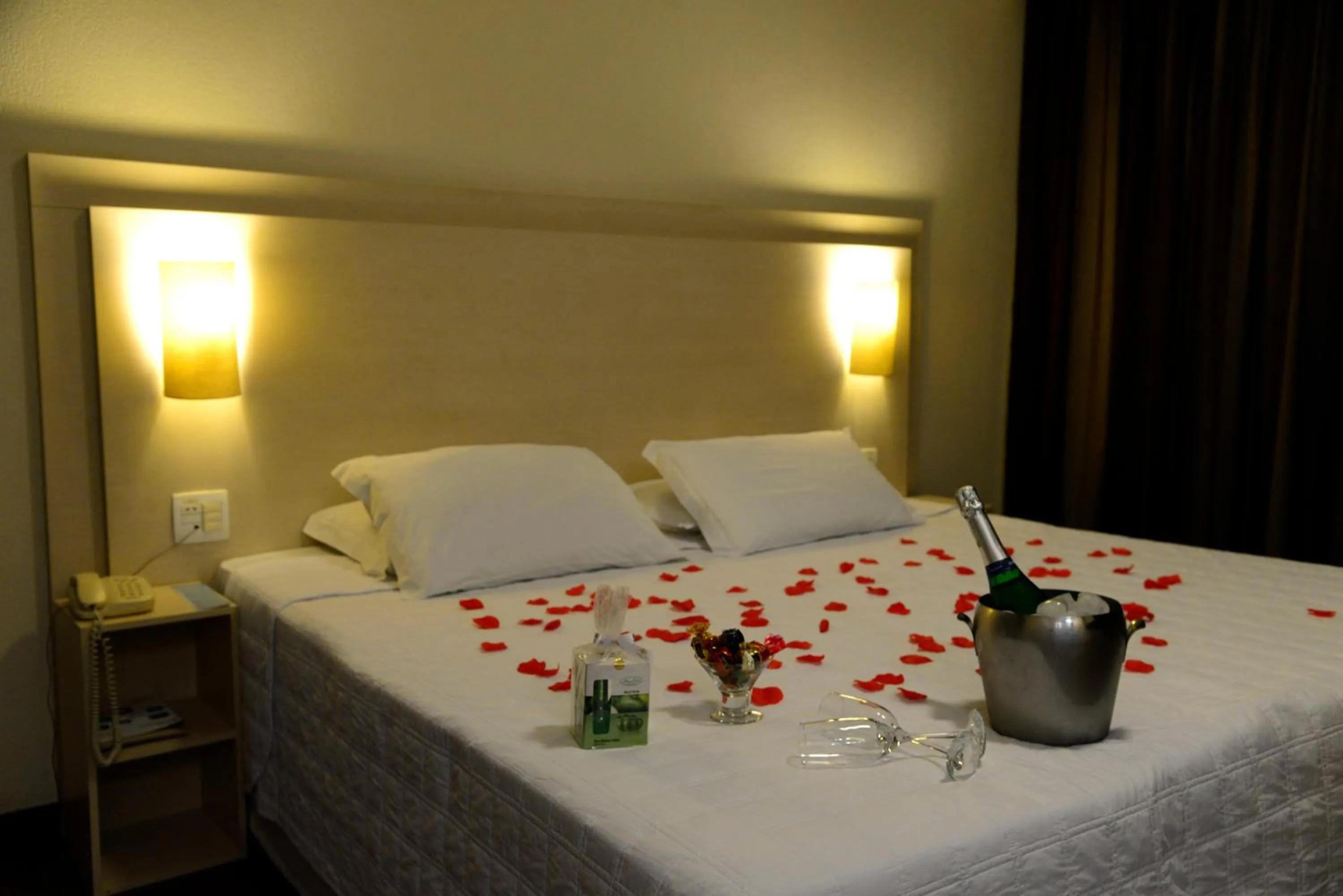 Bed in Golden Blue Hotel