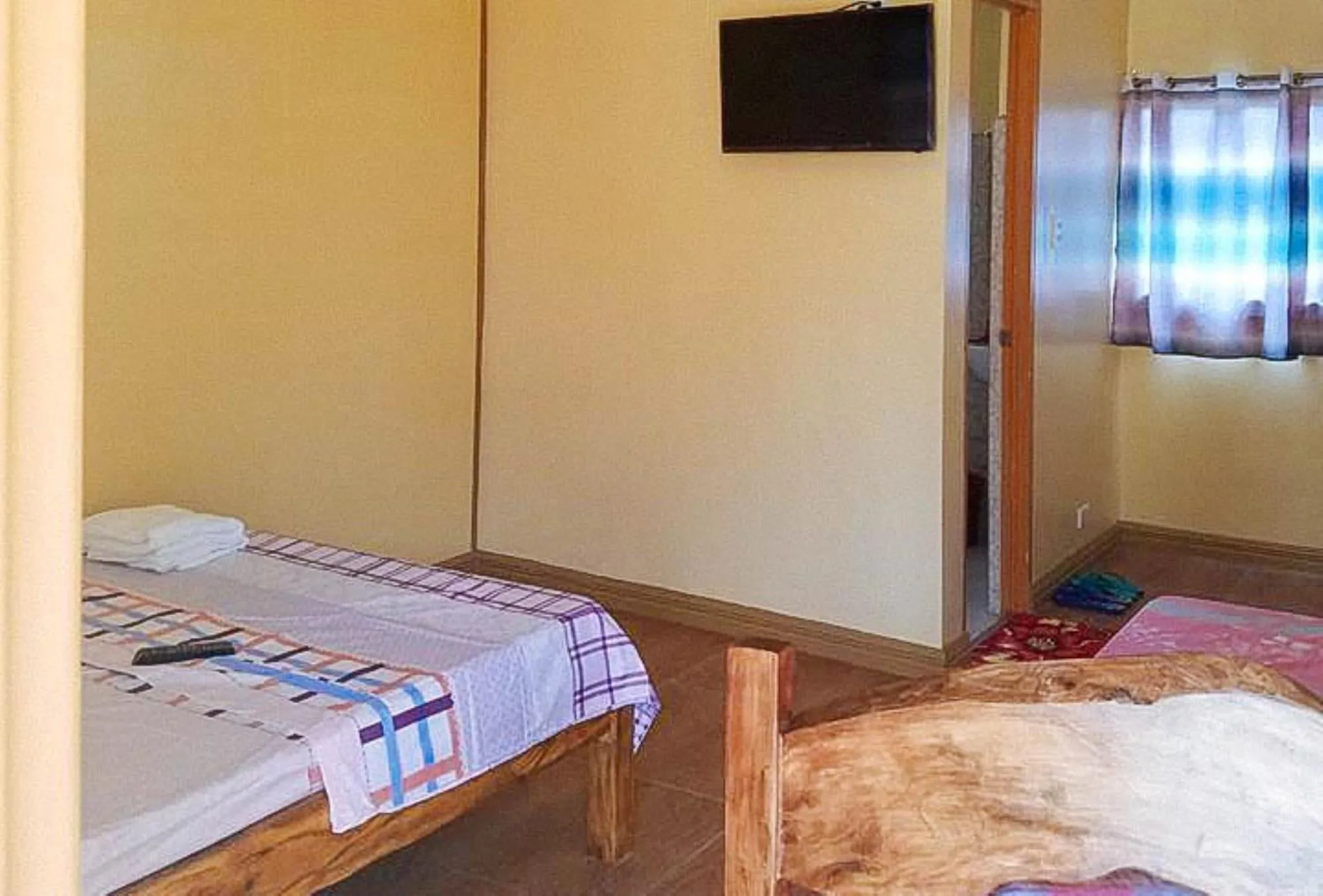 Bed in RedDoorz at Shandy's Transient House Palompon