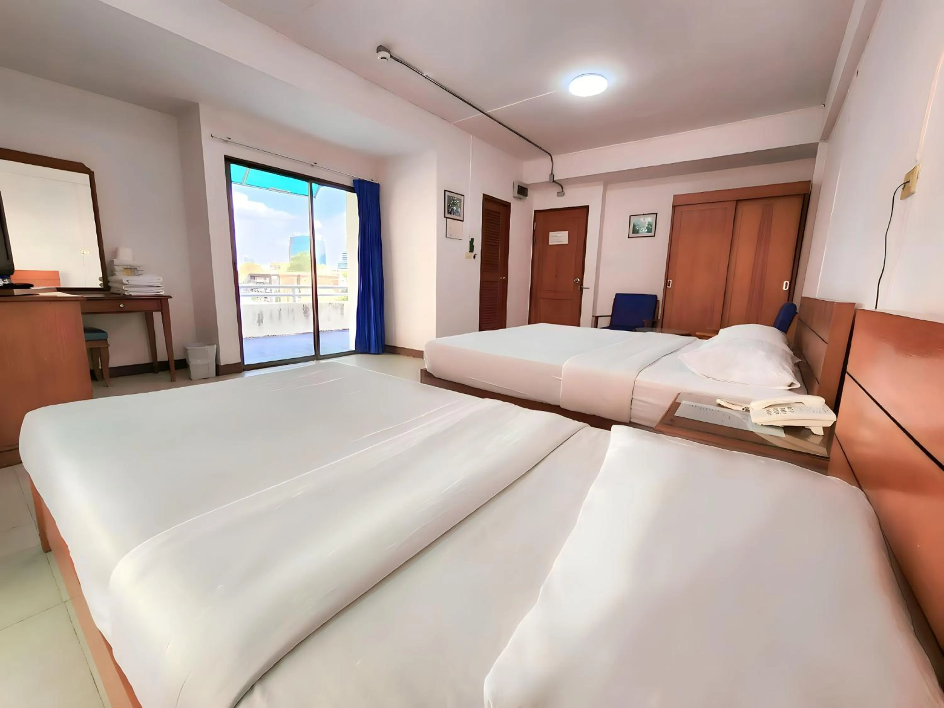 Bed in Siam Palace Hotel