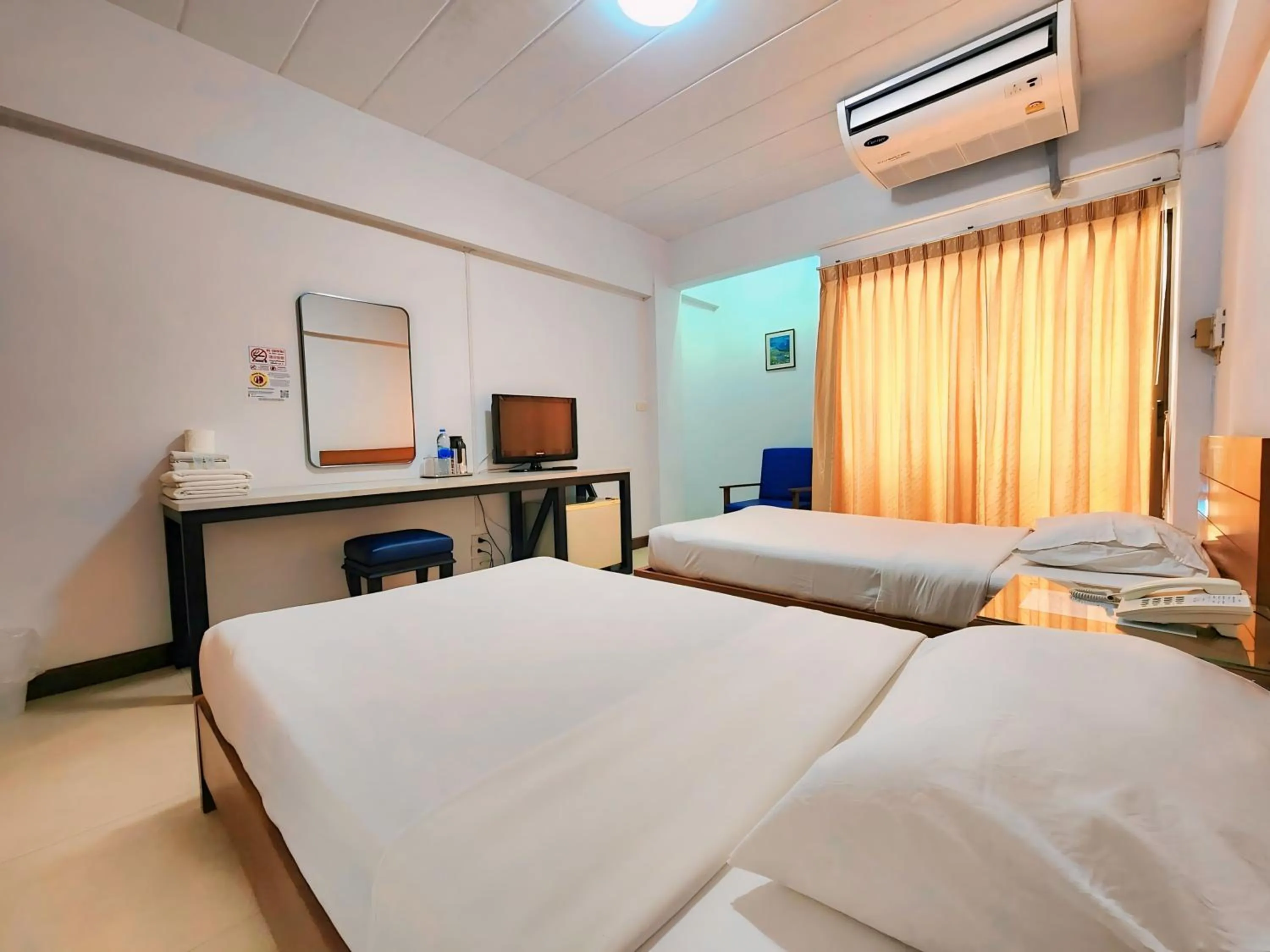 Bed in Siam Palace Hotel