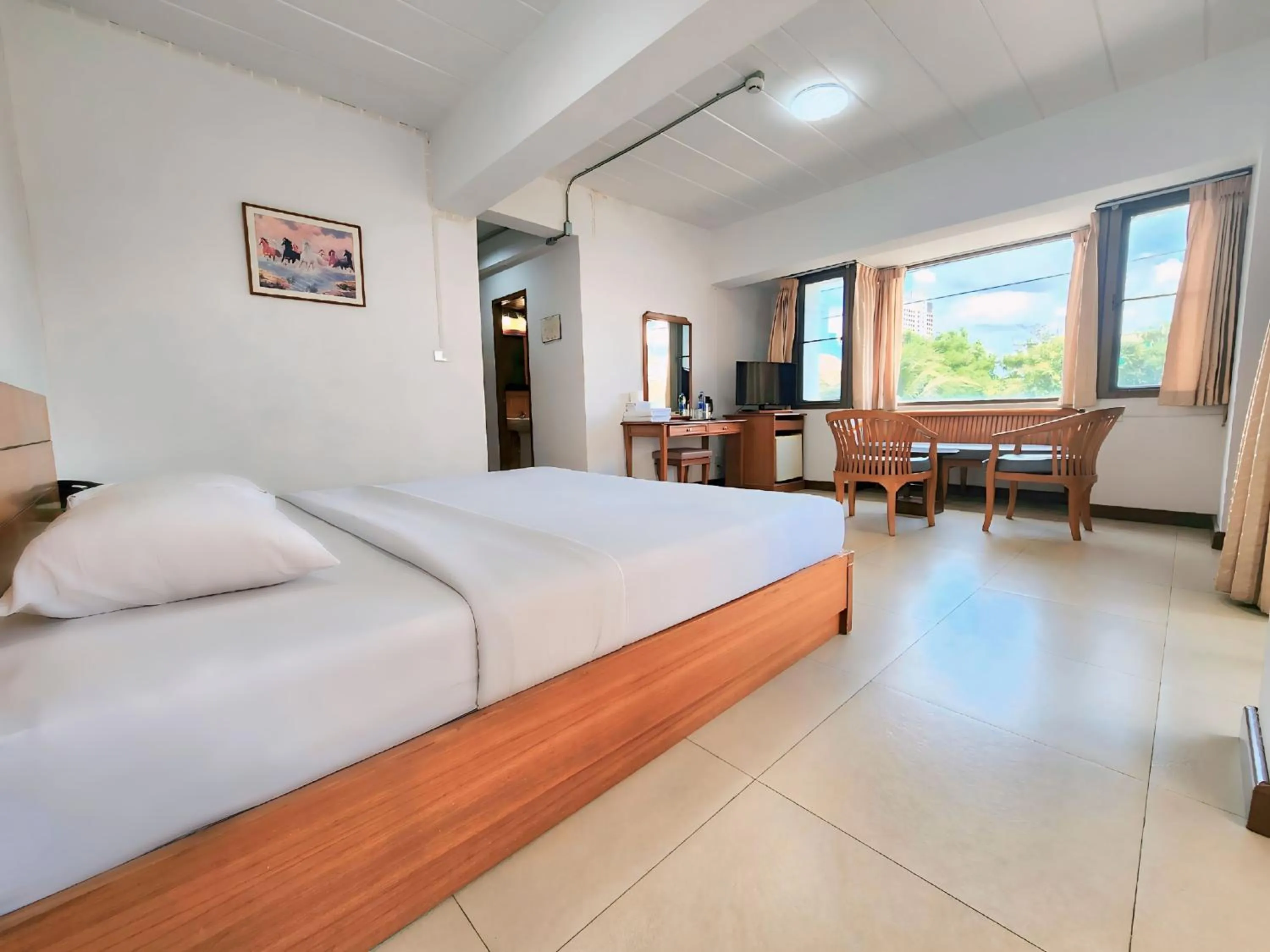 Bed in Siam Palace Hotel