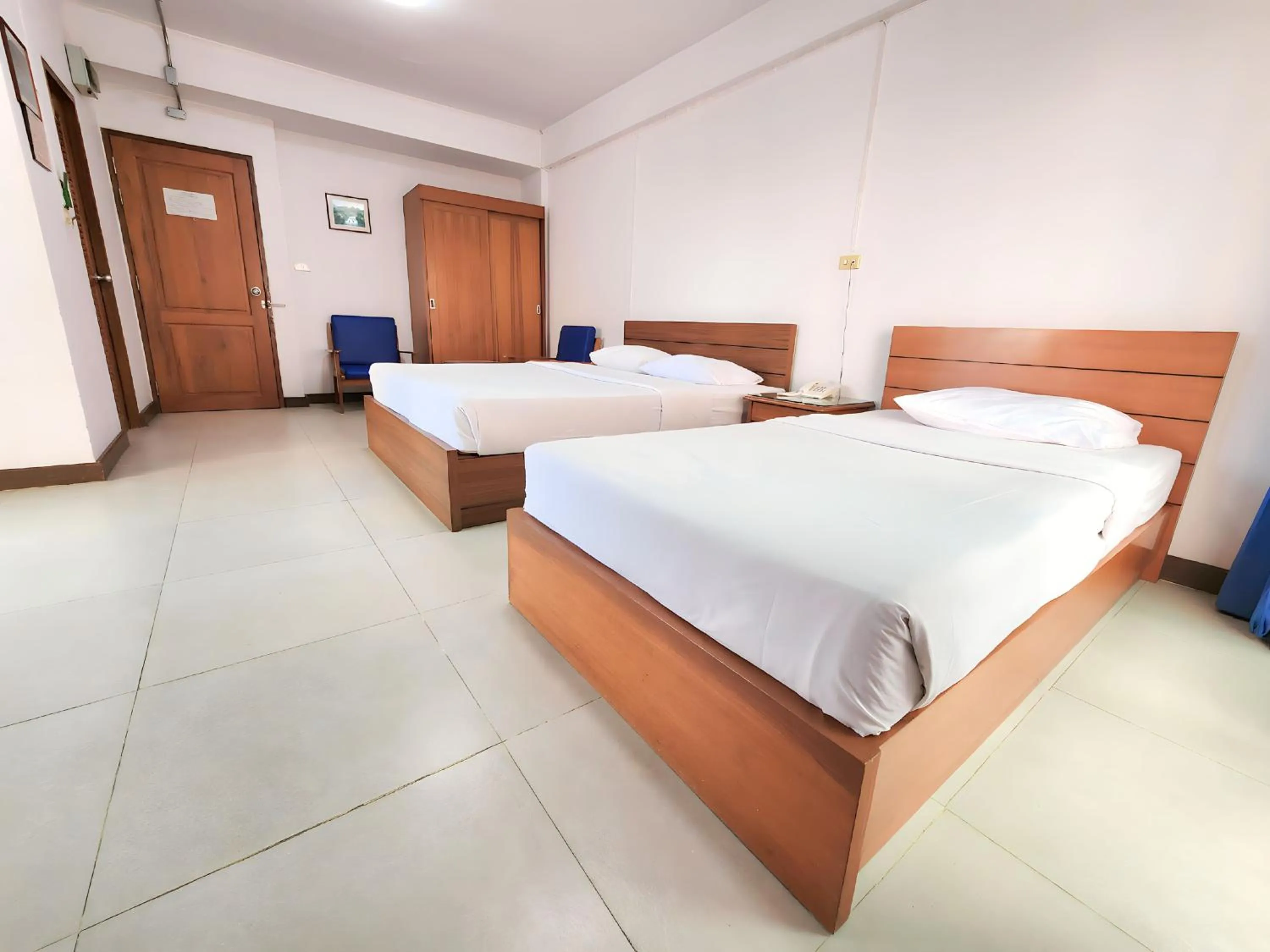 Bed in Siam Palace Hotel