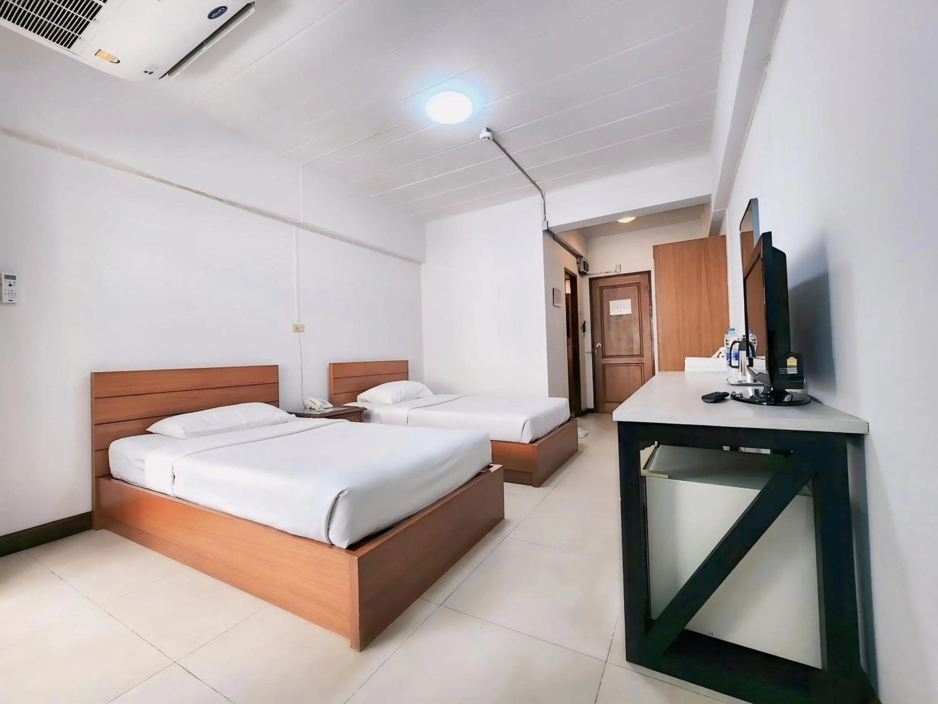 Bed in Siam Palace Hotel