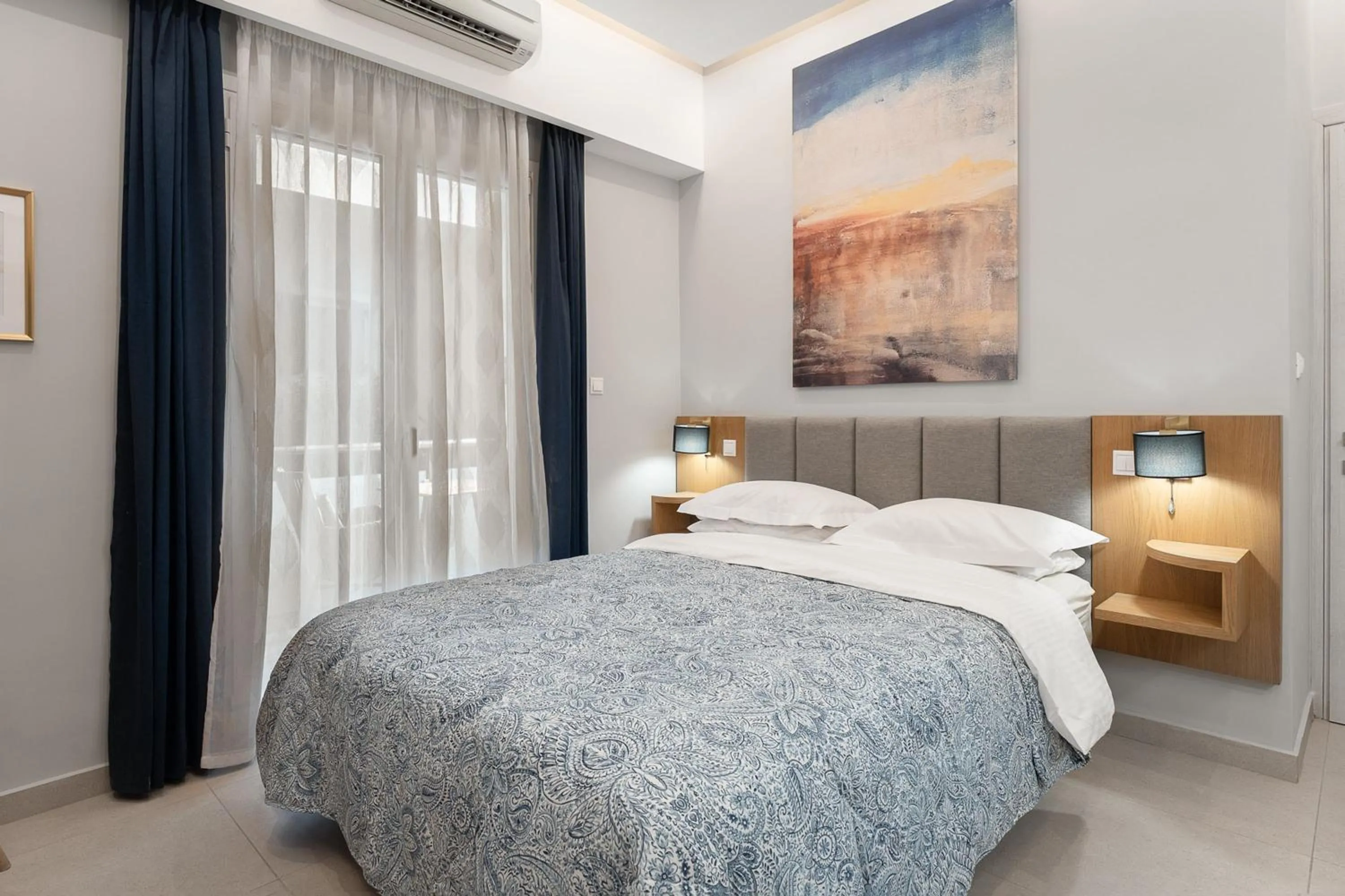 Bed in Captain's Seafront Apartments