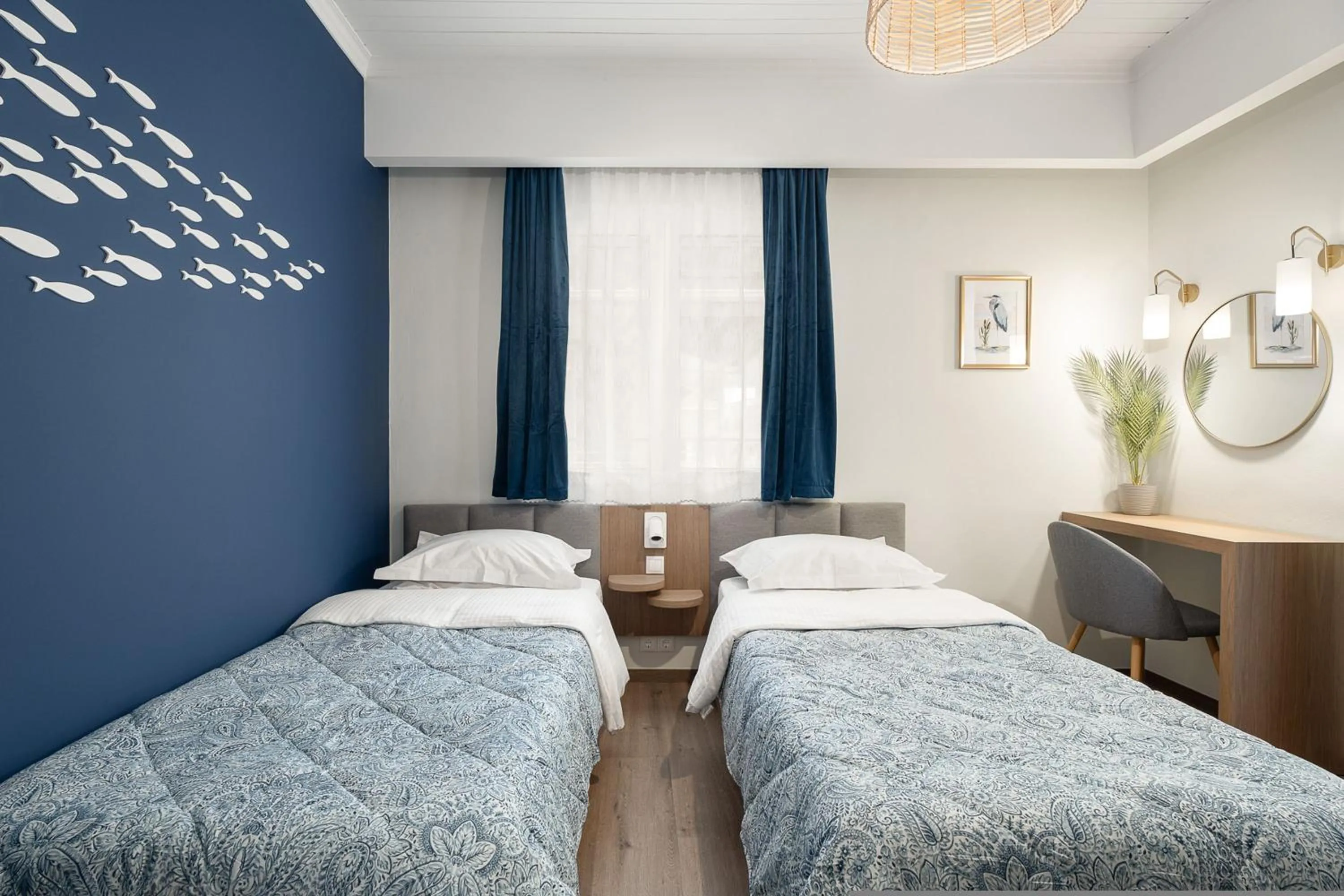 Bed in Captain's Seafront Apartments