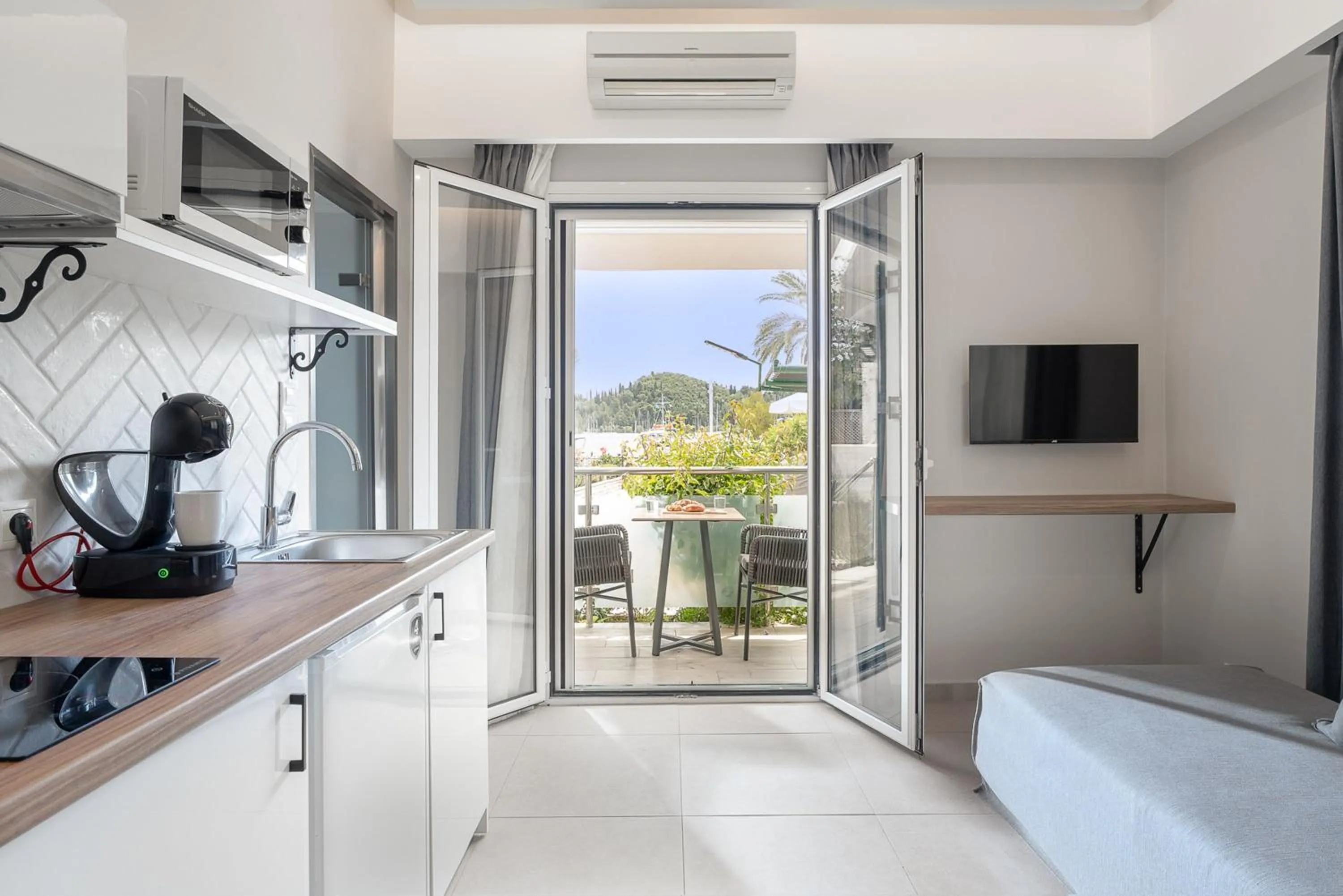 Bed in Captain's Seafront Apartments