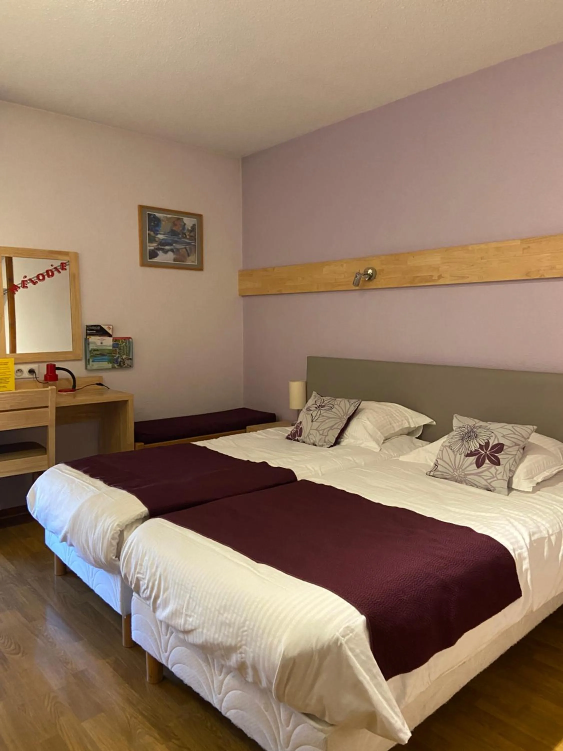 Bed in Hôtel Mélodie