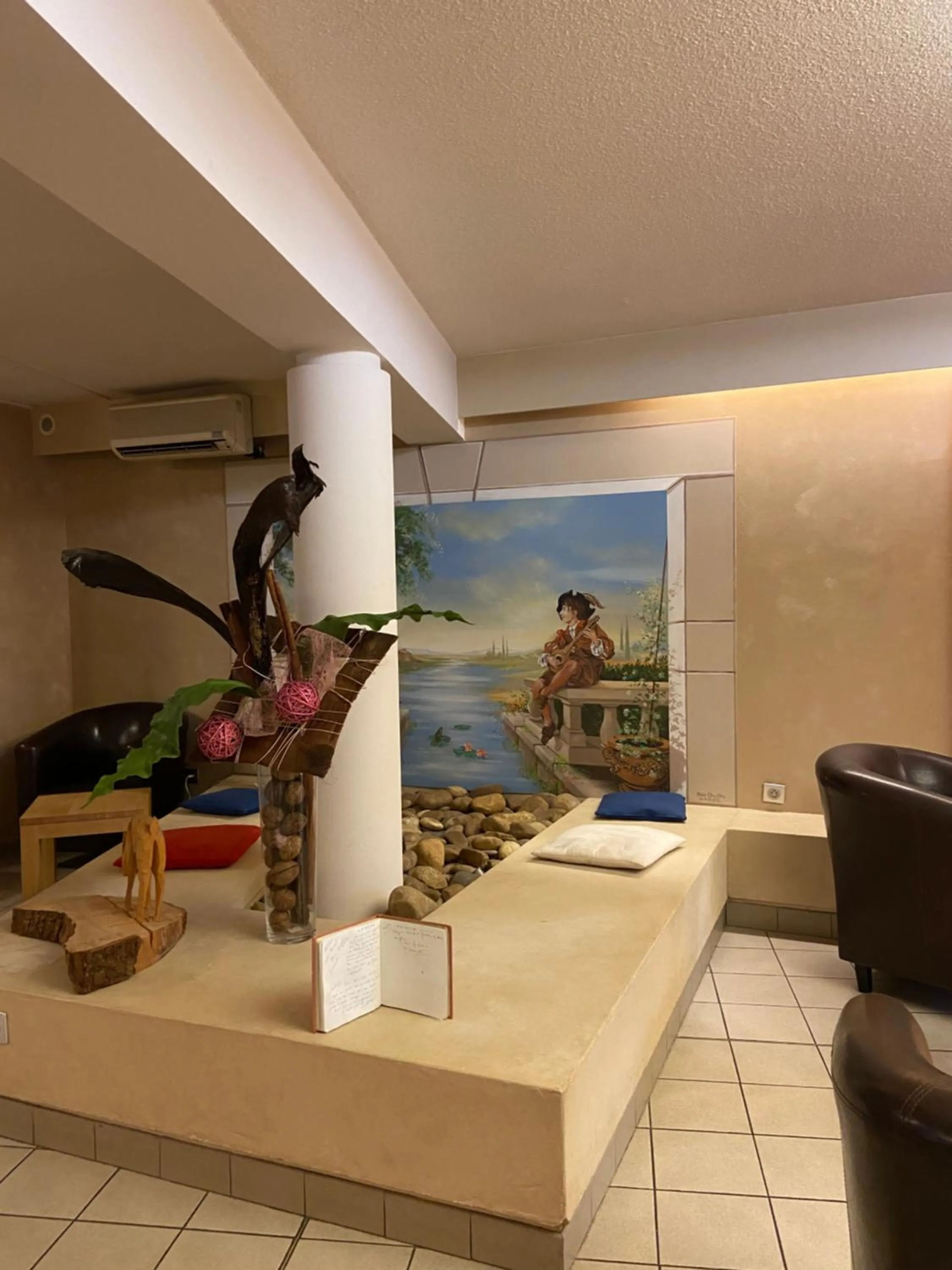 Lounge or bar in Hôtel Mélodie