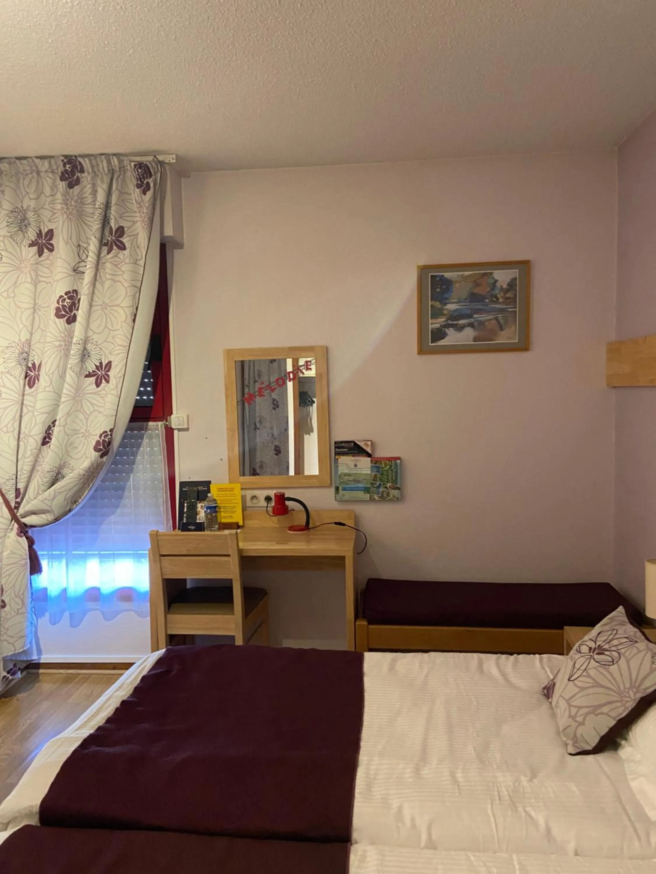 Bed in Hôtel Mélodie