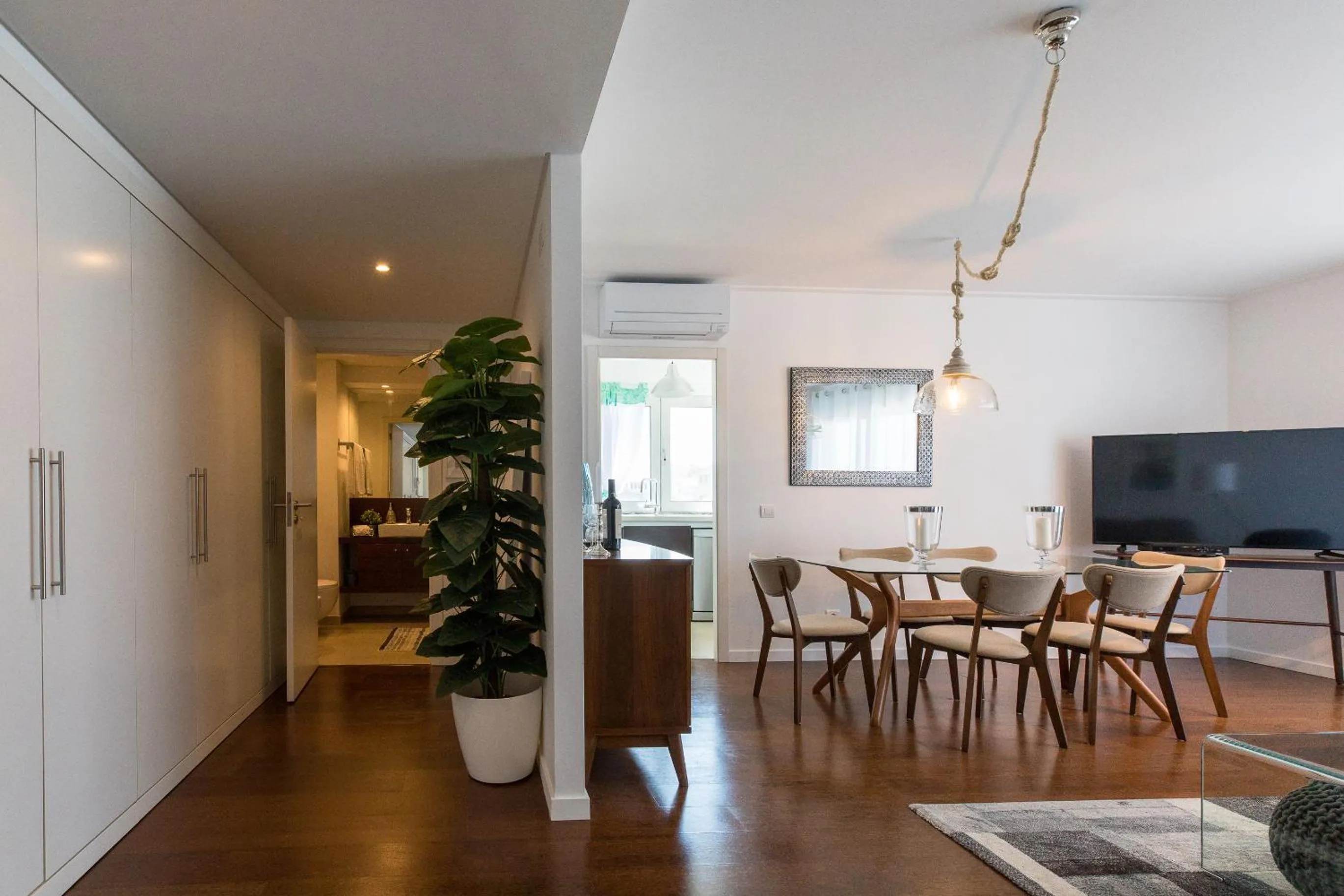 TV and multimedia in Charming Apartment with Balcony & Pool