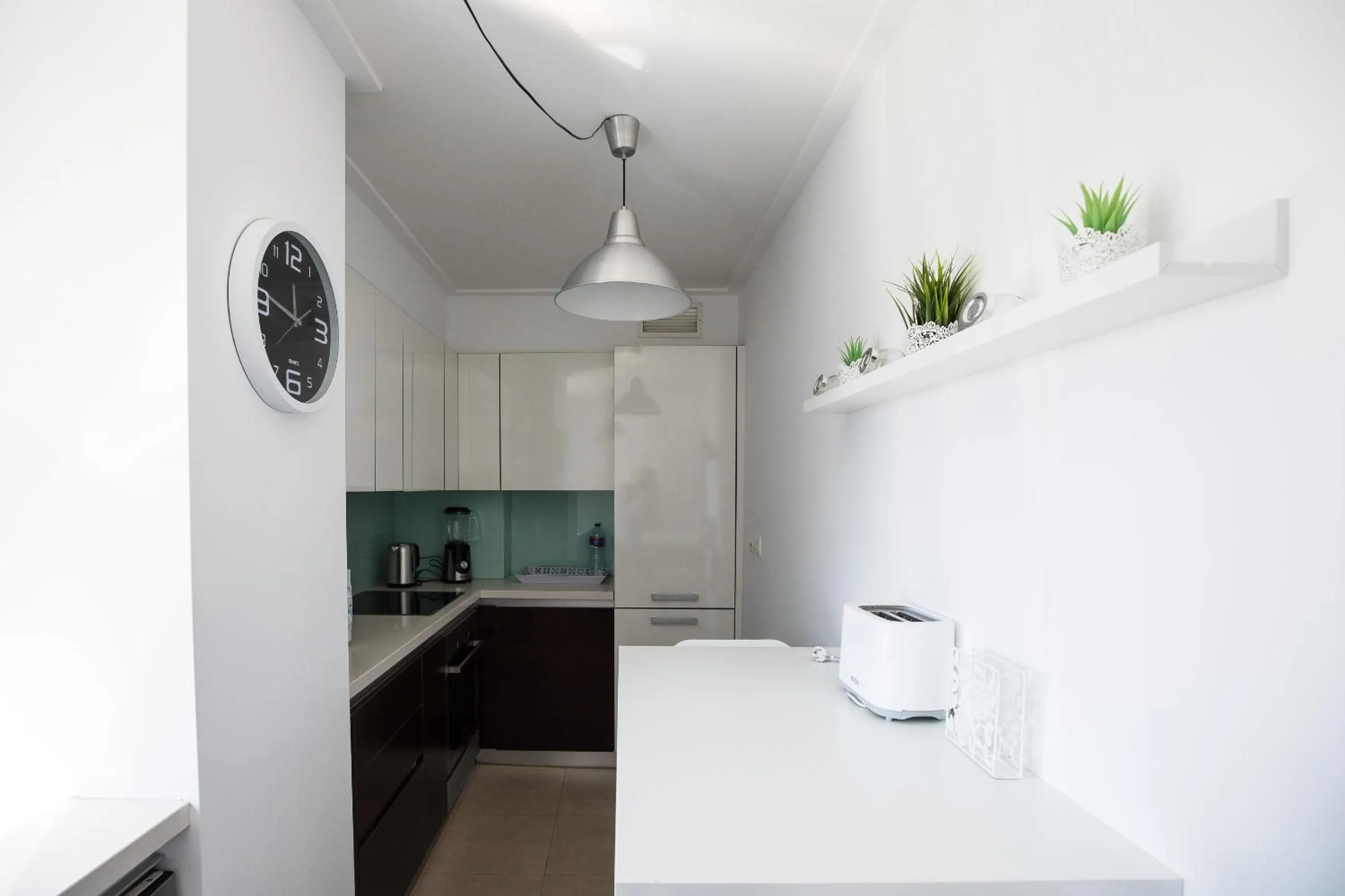 Kitchen or kitchenette in Charming Apartment with Balcony & Pool