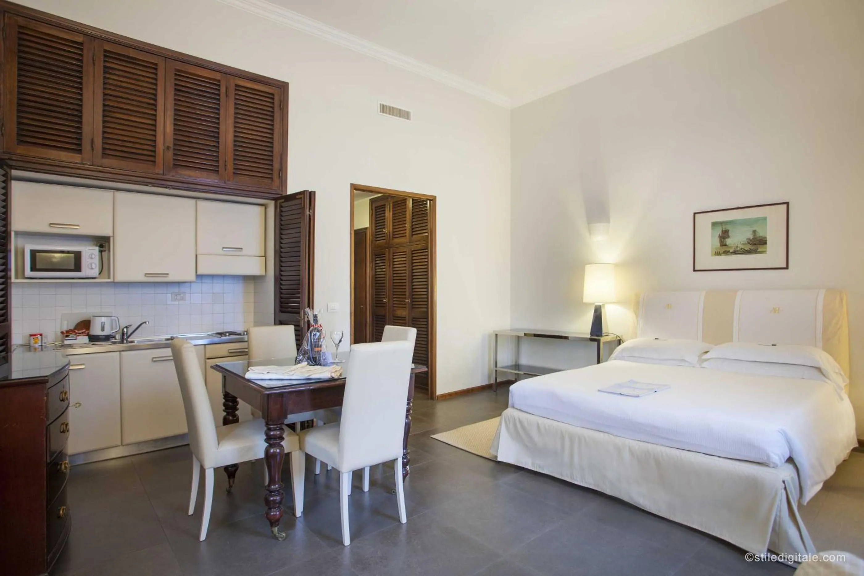 Bed in Aldrovandi Residence City Suites
