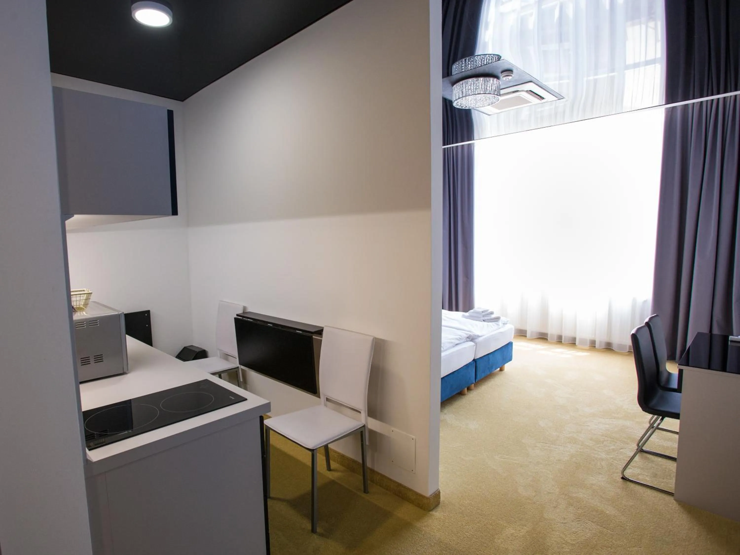 Kitchen or kitchenette, Bed in Apart Hotel GOLDEN apartments