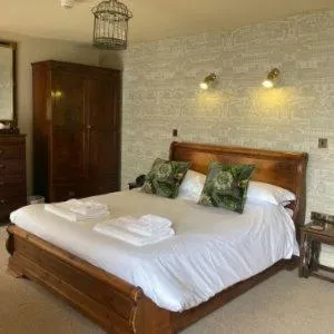 Bed in The Punch Bowl Inn