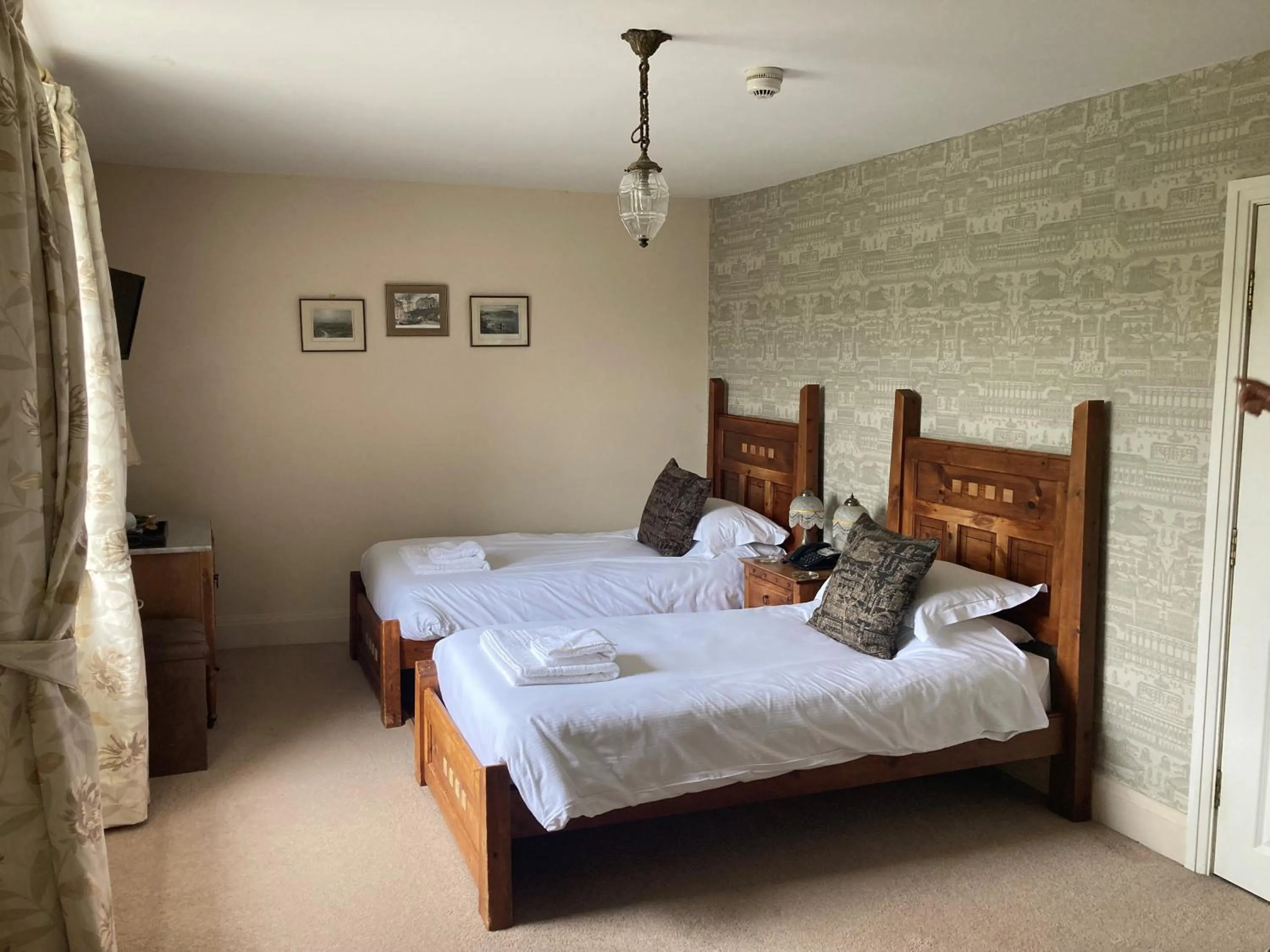 Bed in The Punch Bowl Inn