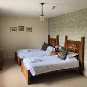 Bed in The Punch Bowl Inn