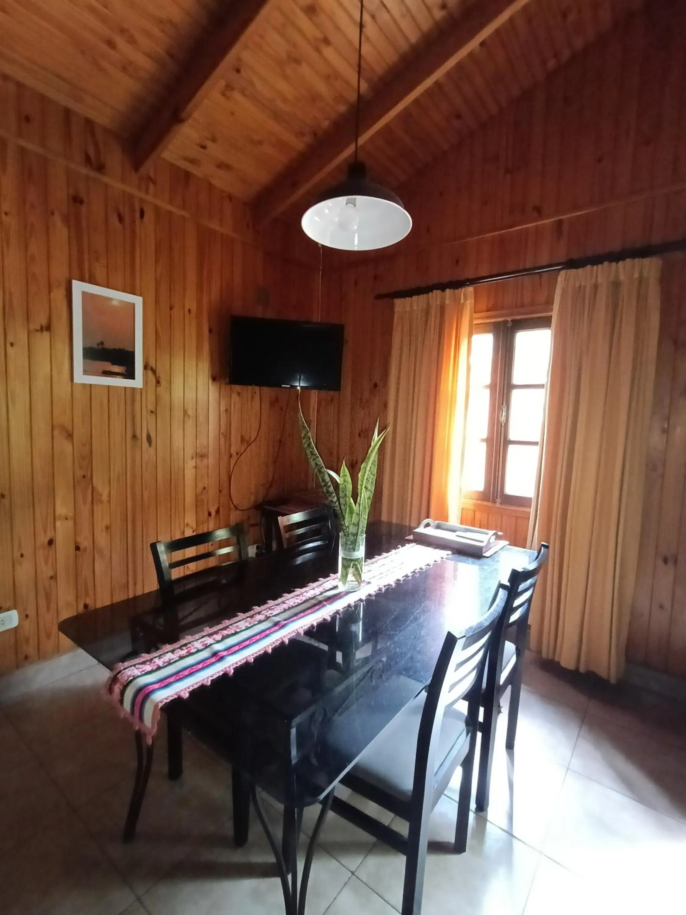 TV and multimedia in El Descanso Iguazú by DOT Cabana