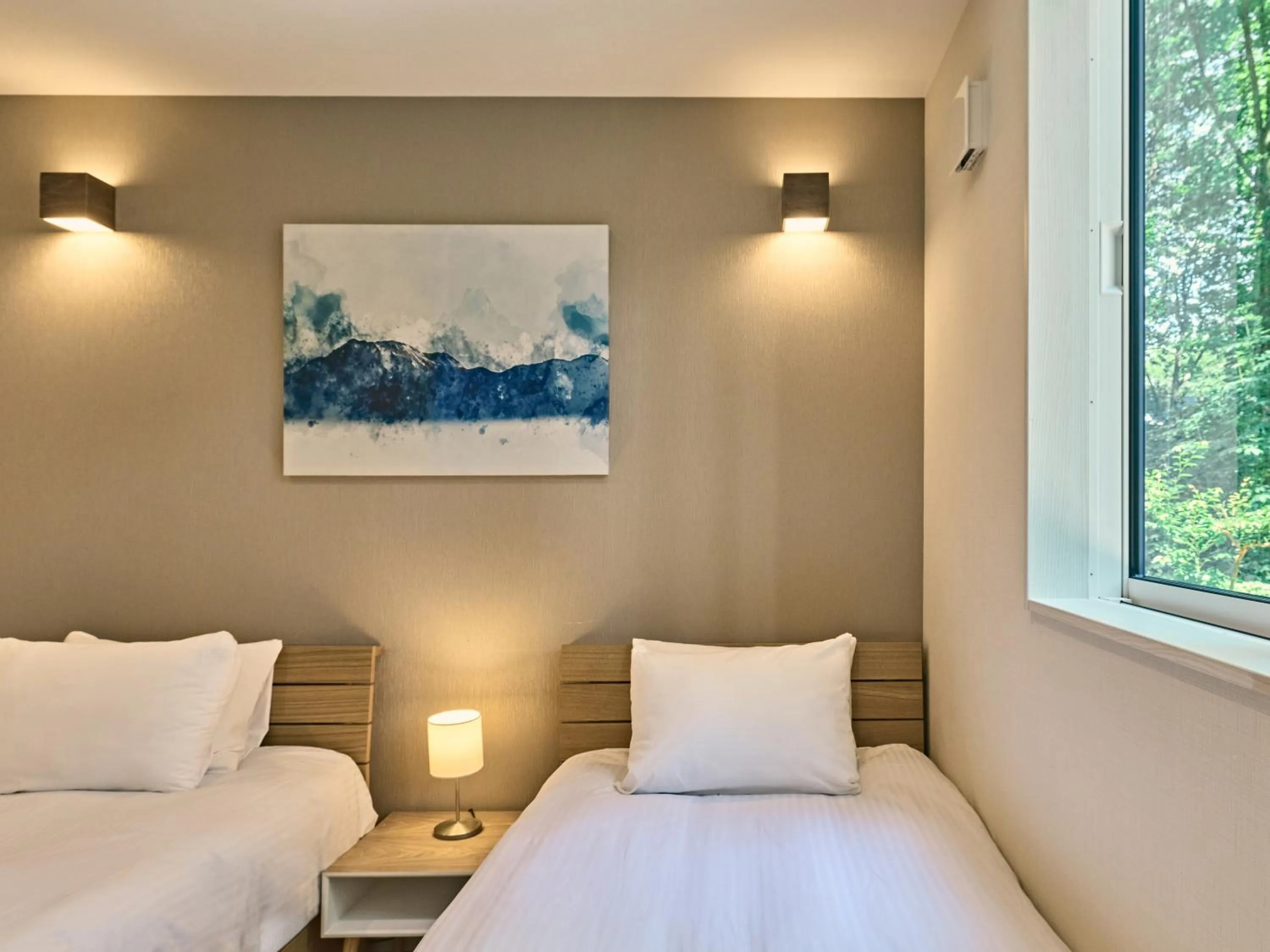 Bed in The Seasons Apartments Hakuba