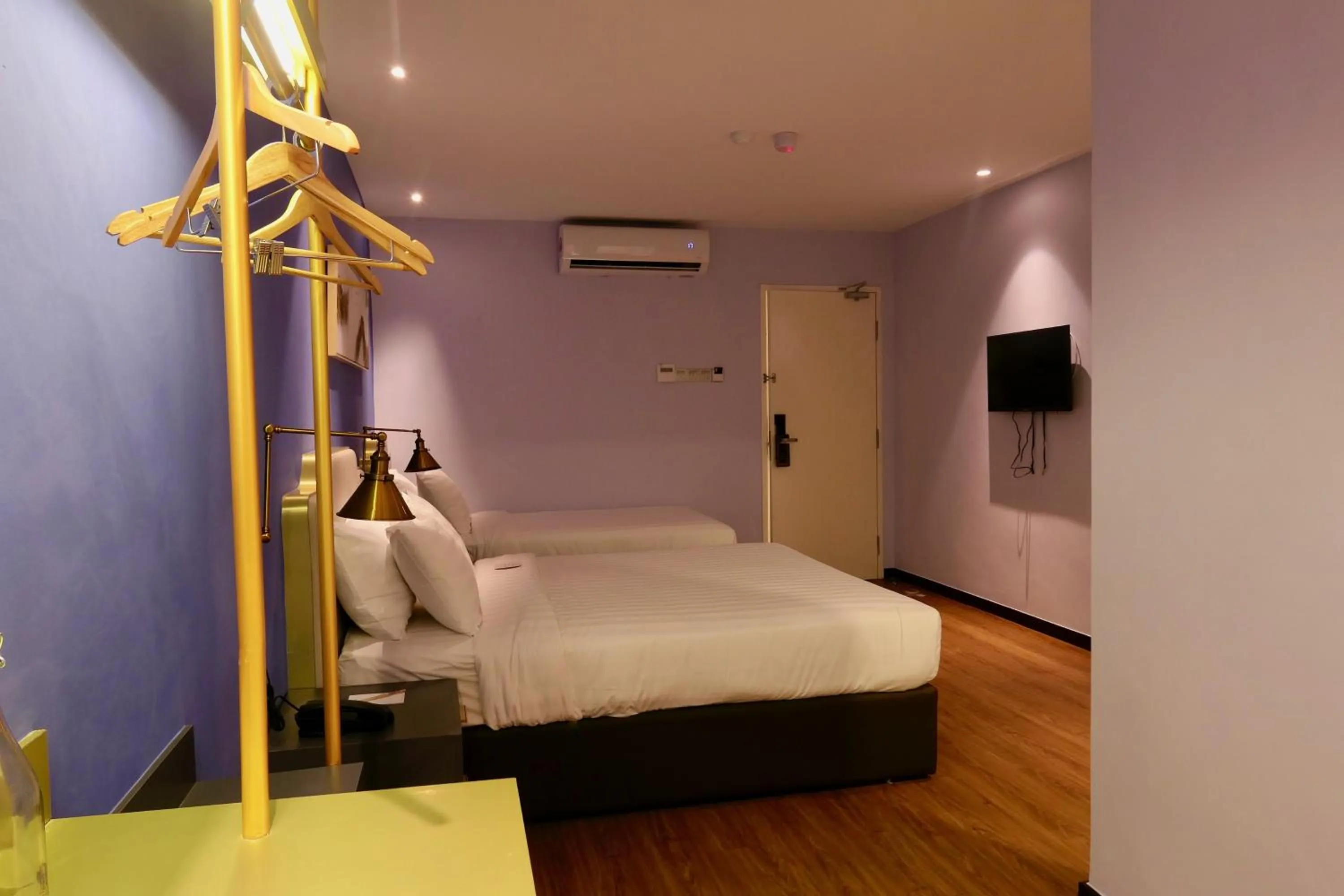 Bed in Le Embassy Hotel Georgetown