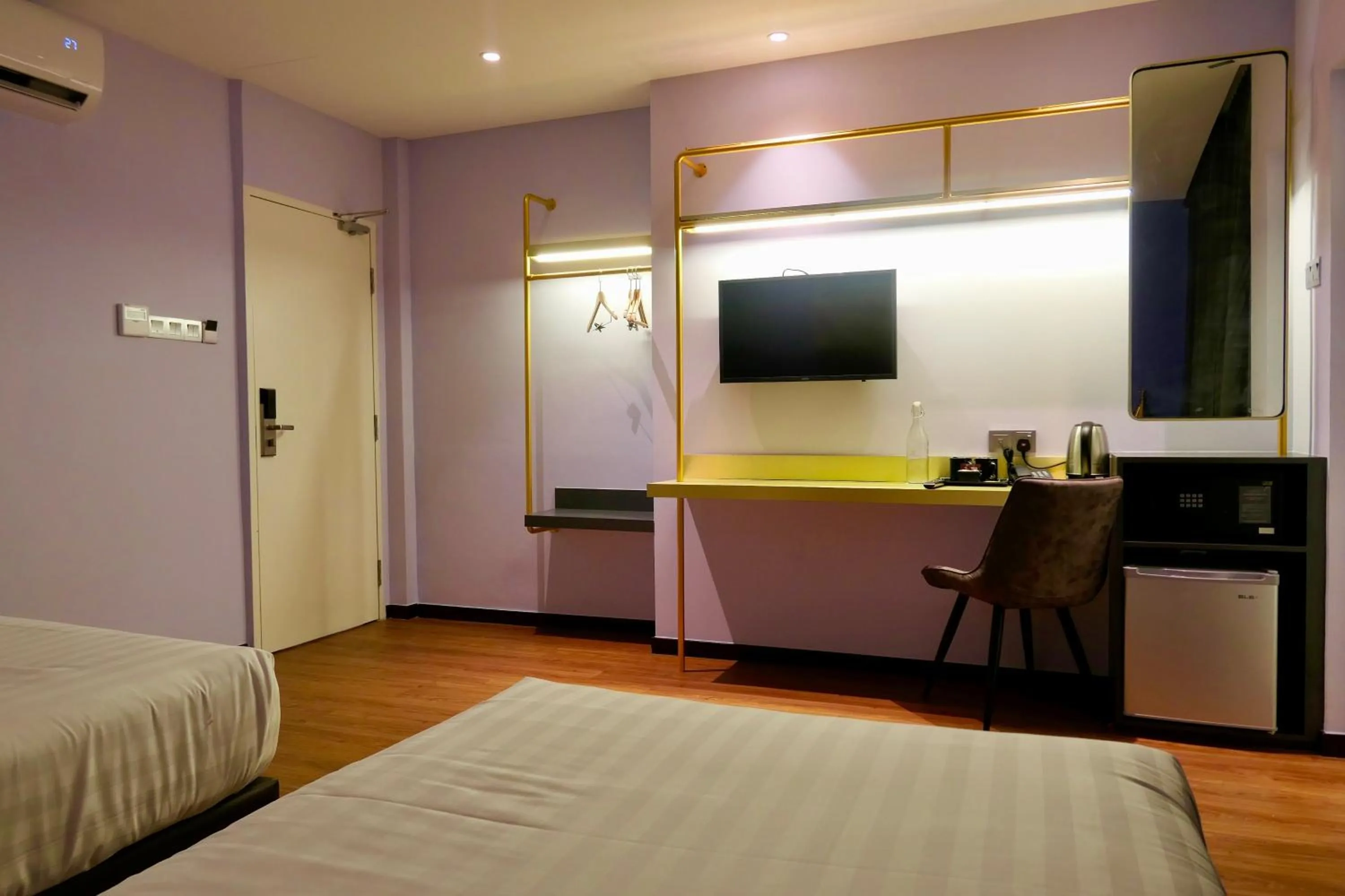 Bed in Le Embassy Hotel Georgetown