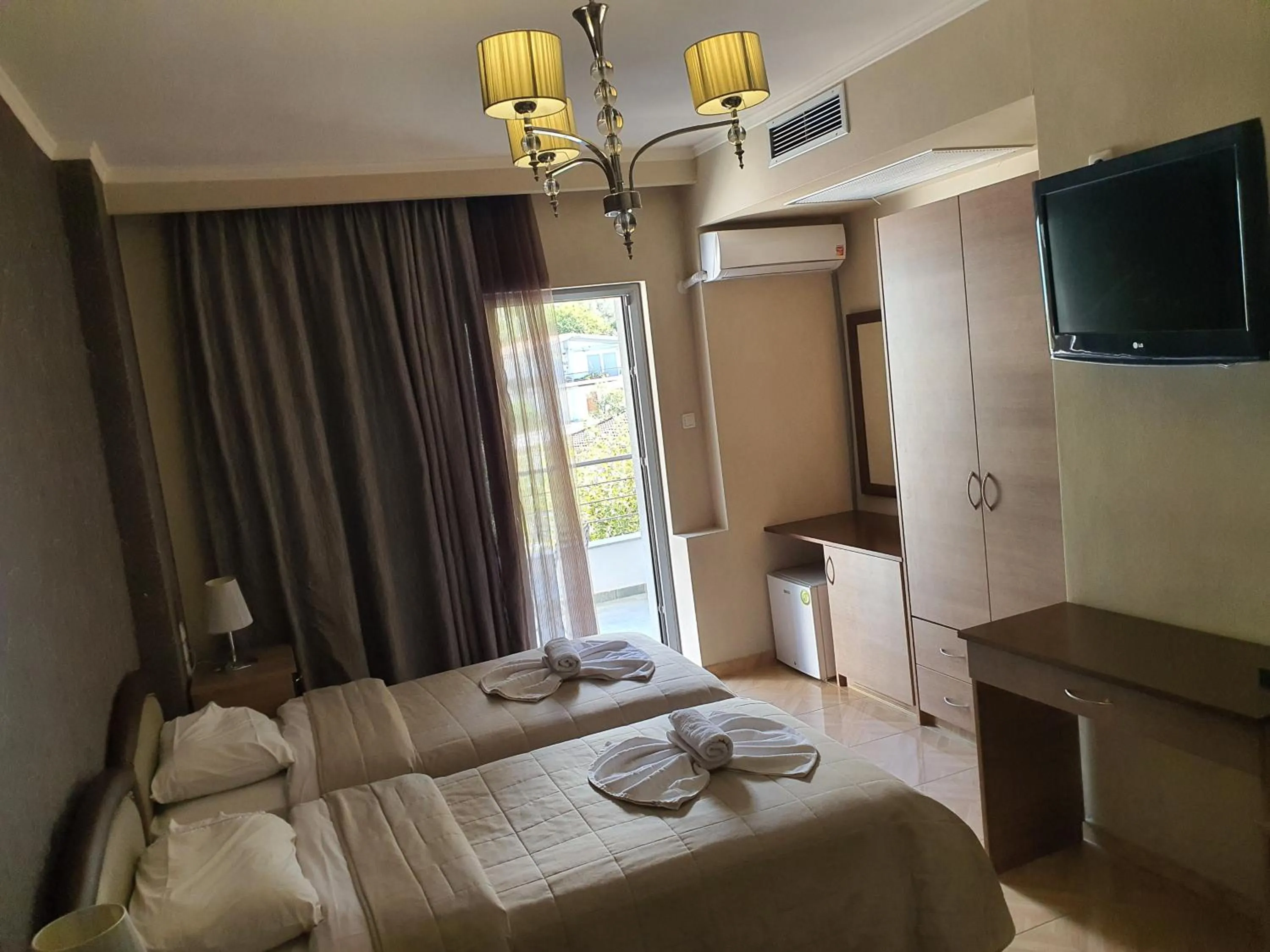 Photo of the whole room, Bed in Delfini Hotel