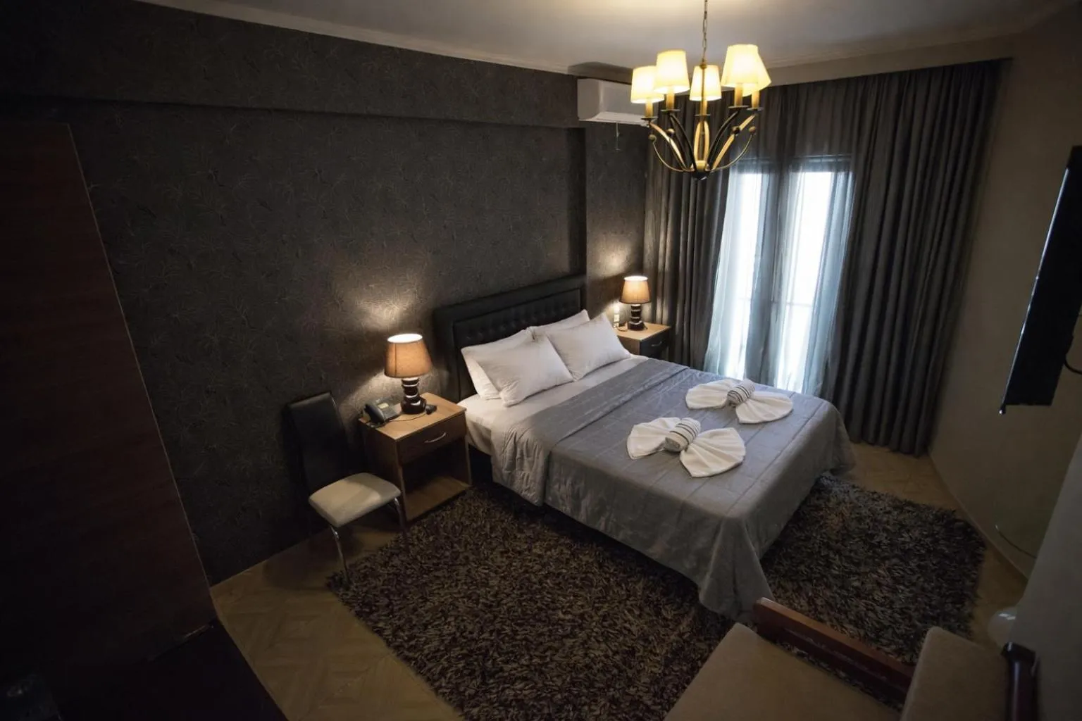 Photo of the whole room, Bed in Delfini Hotel