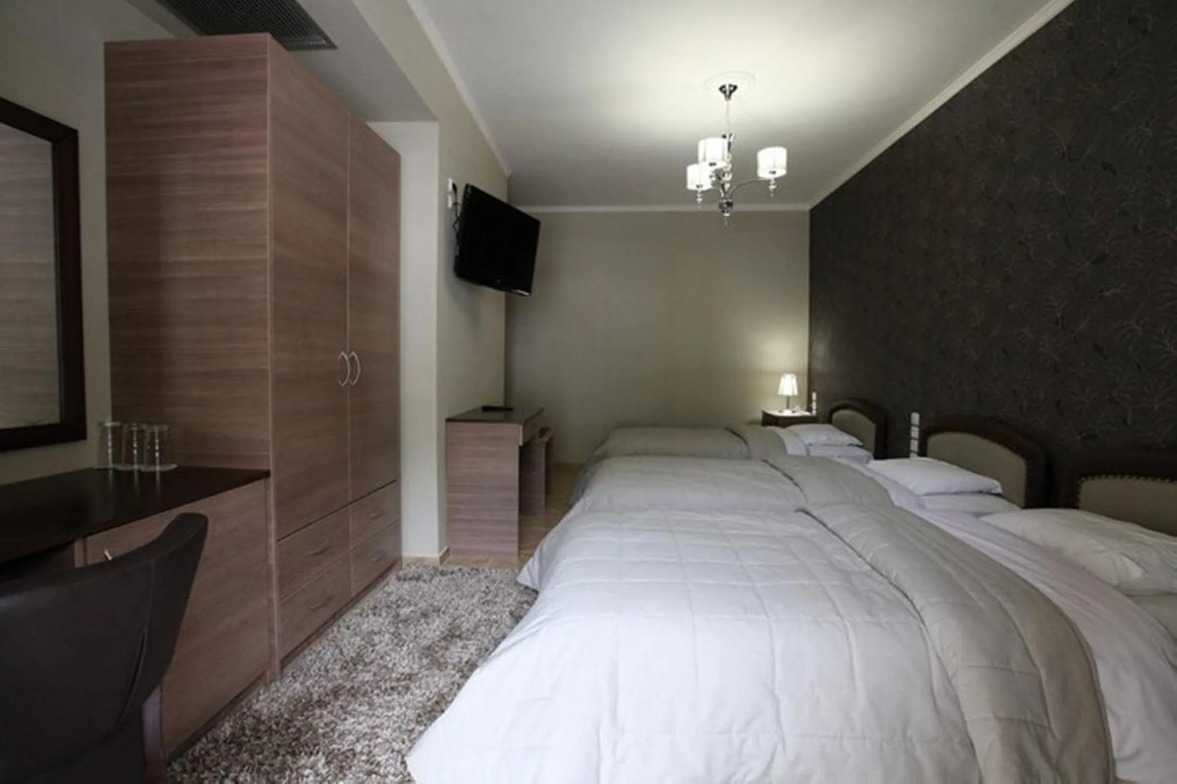 Photo of the whole room, Bed in Delfini Hotel