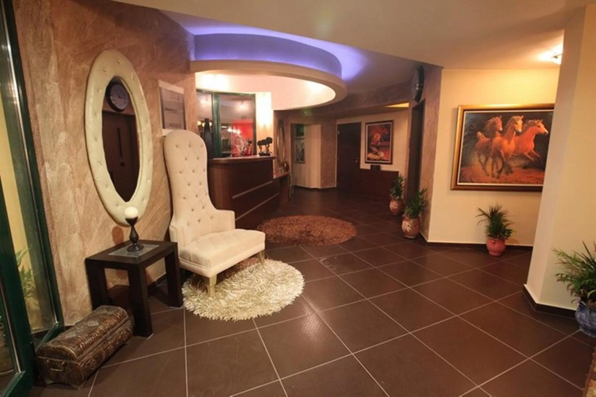 Lobby or reception in Delfini Hotel