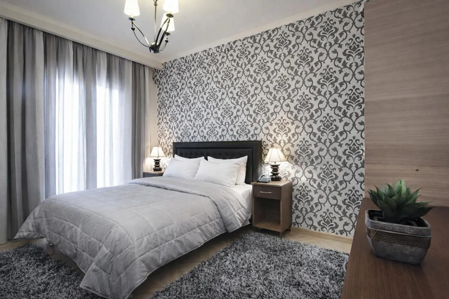 Photo of the whole room, Bed in Delfini Hotel