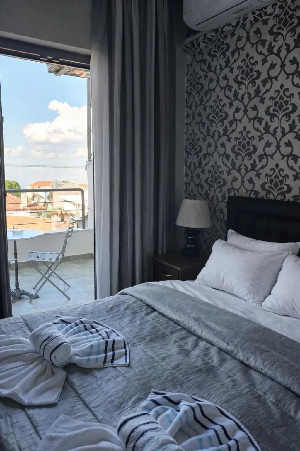 View (from property/room), Bed in Delfini Hotel
