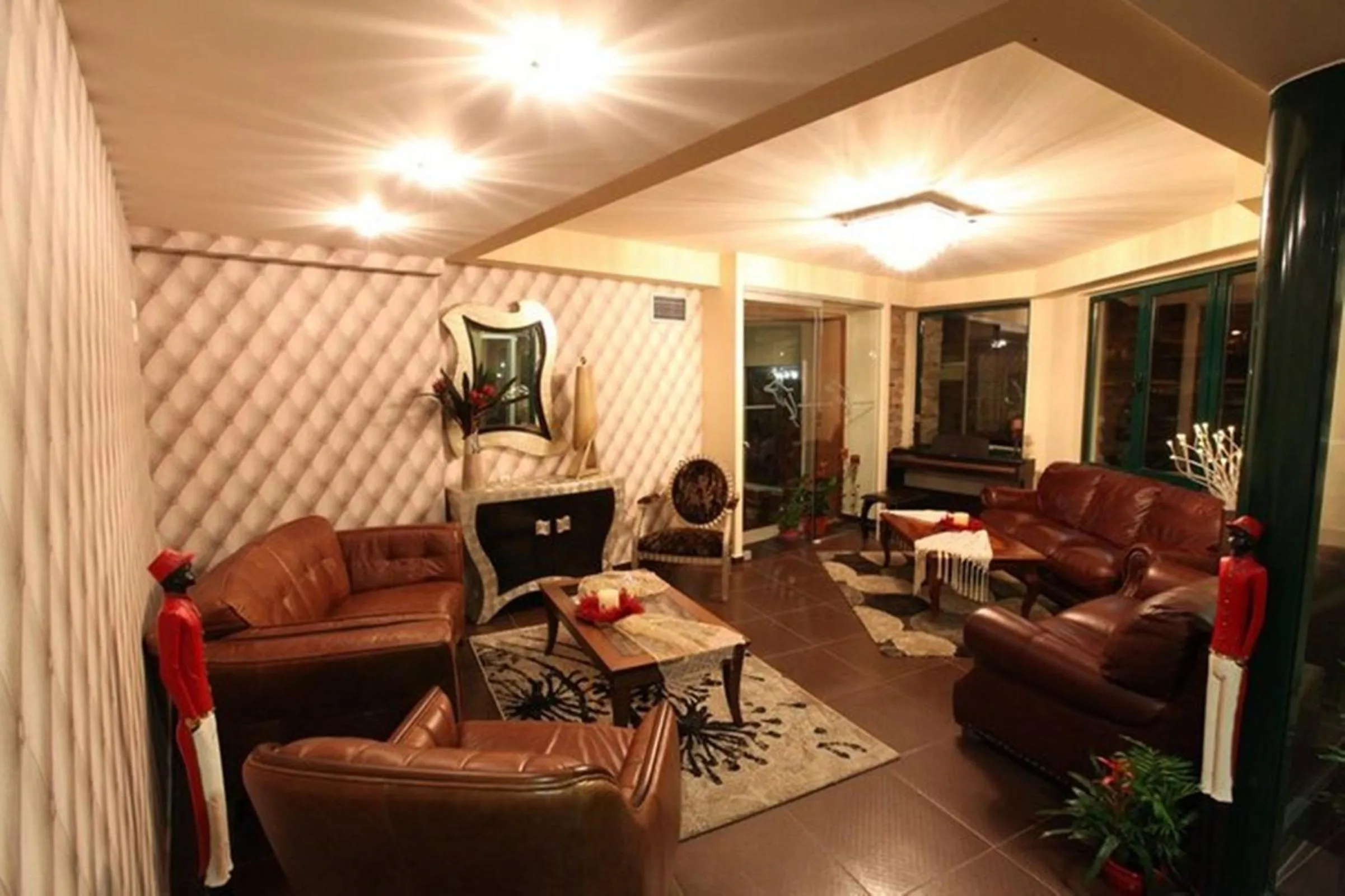 Lobby or reception in Delfini Hotel