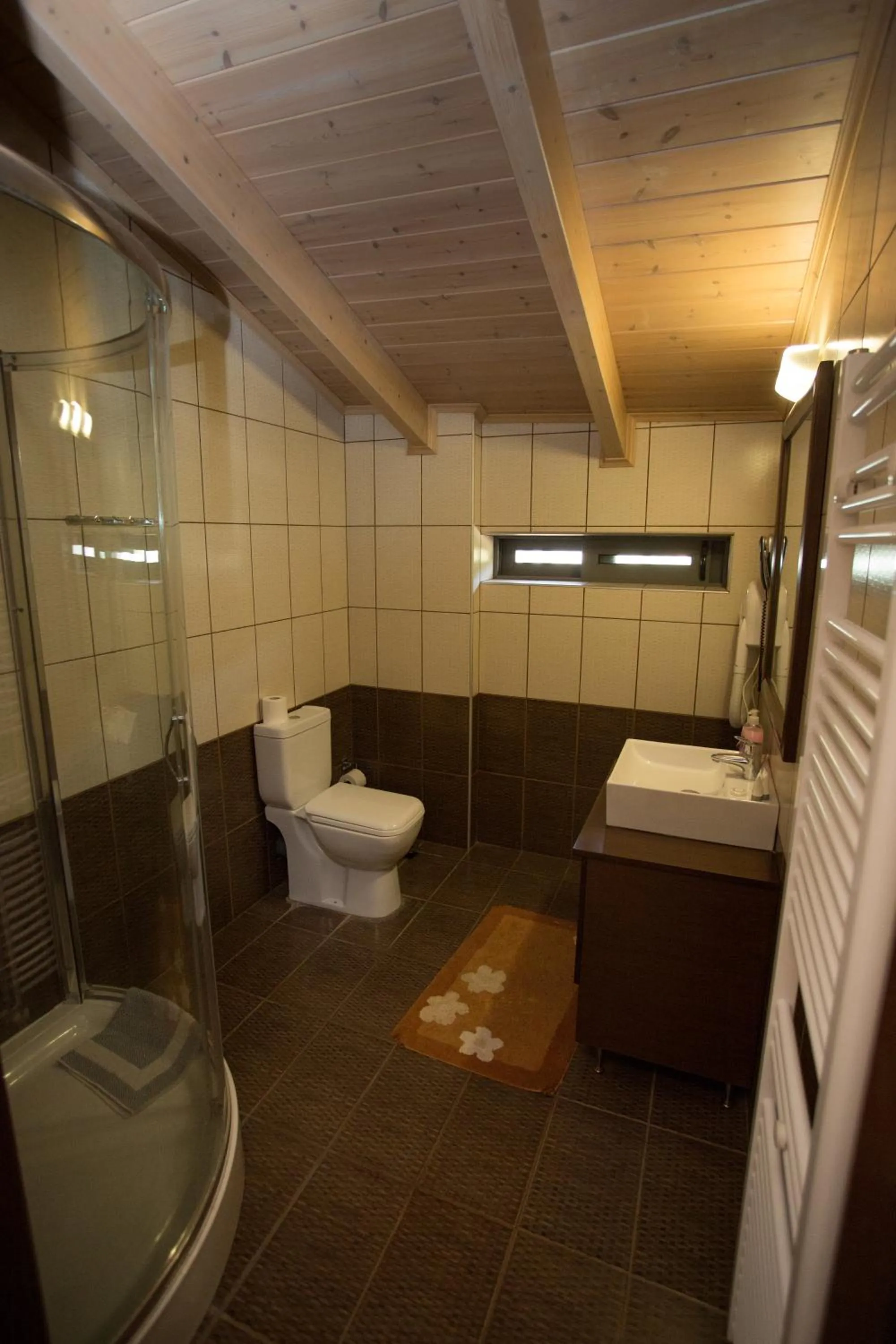 Bathroom in Delfini Hotel