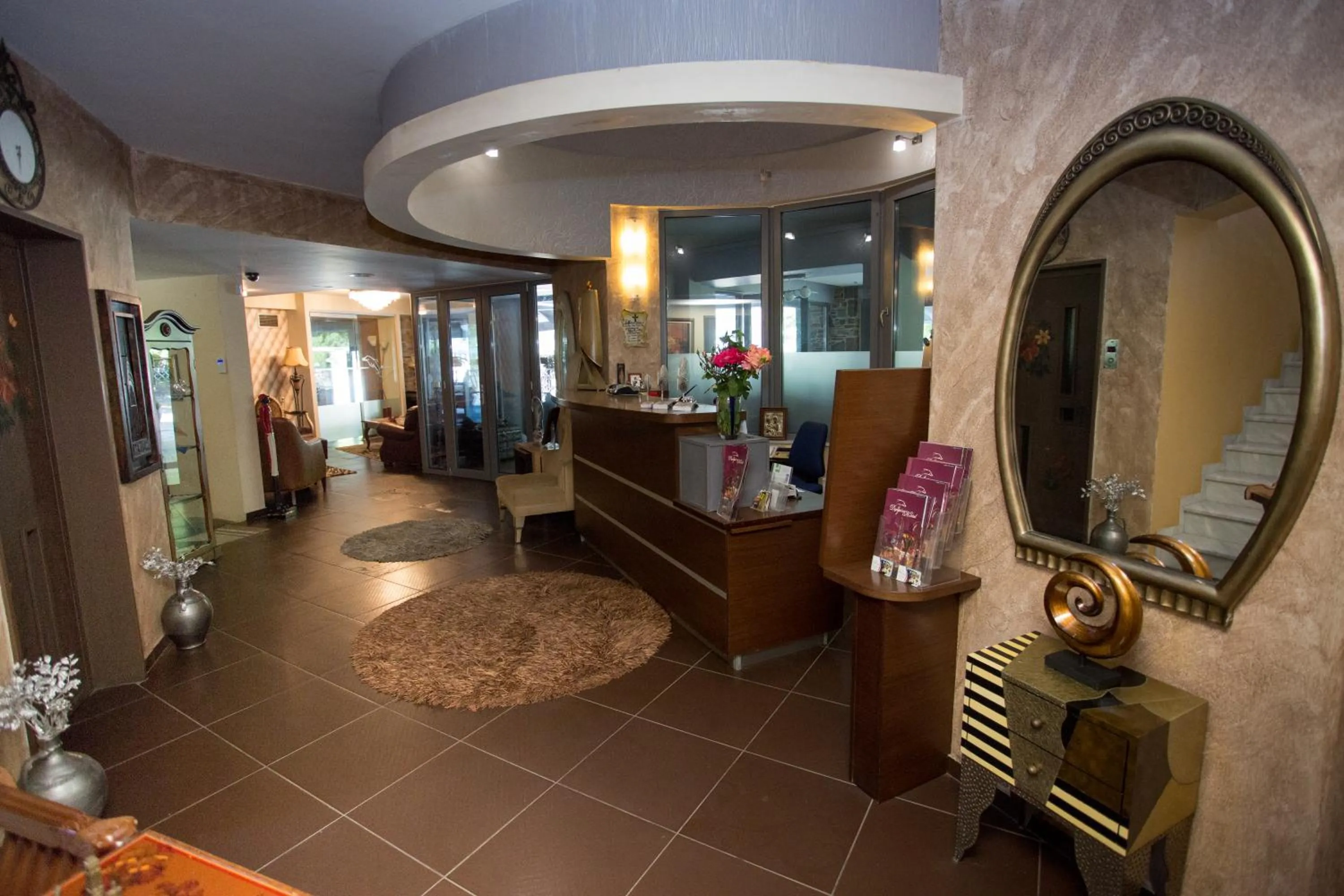 Lobby or reception in Delfini Hotel