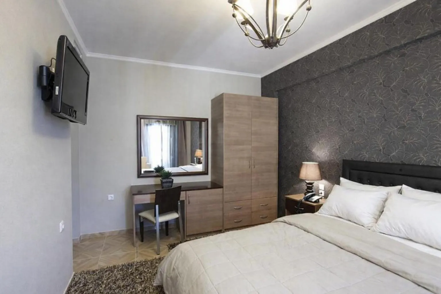 Bed in Delfini Hotel