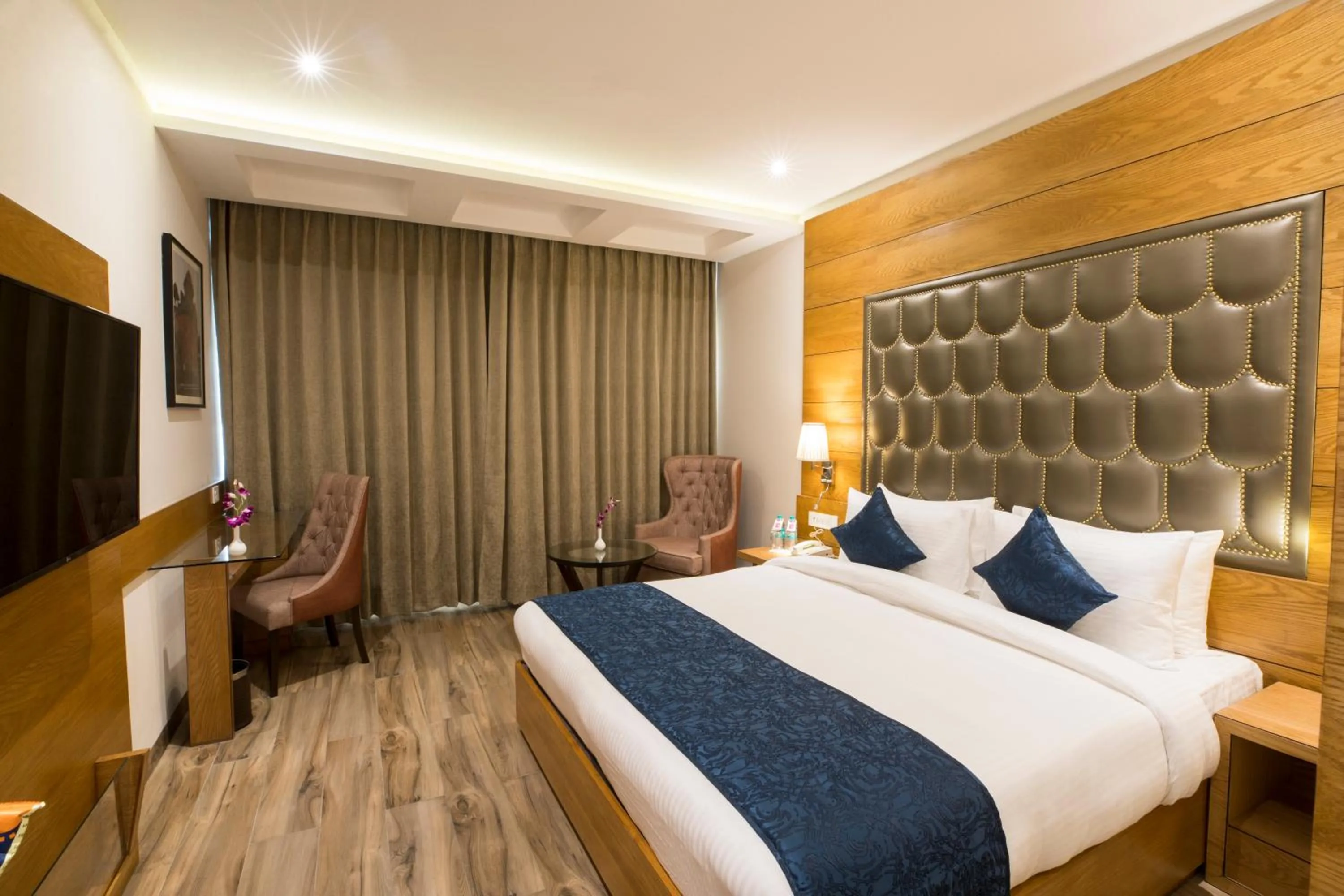 Photo of the whole room, Bed in Regenta Central Cassia Zirakpur Chandigarh