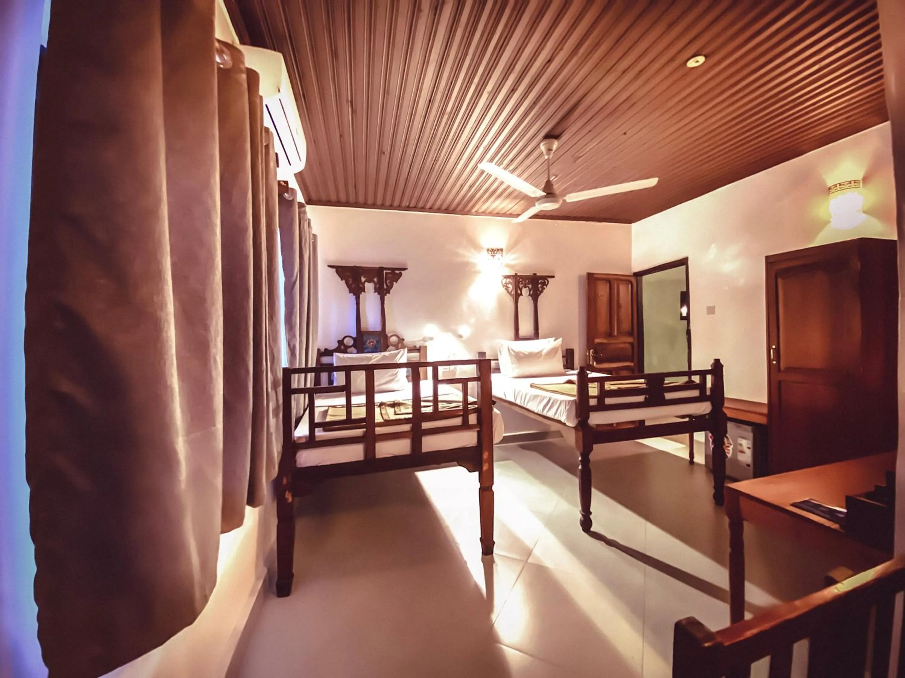 Bed in Smiles Stone Town Hotel