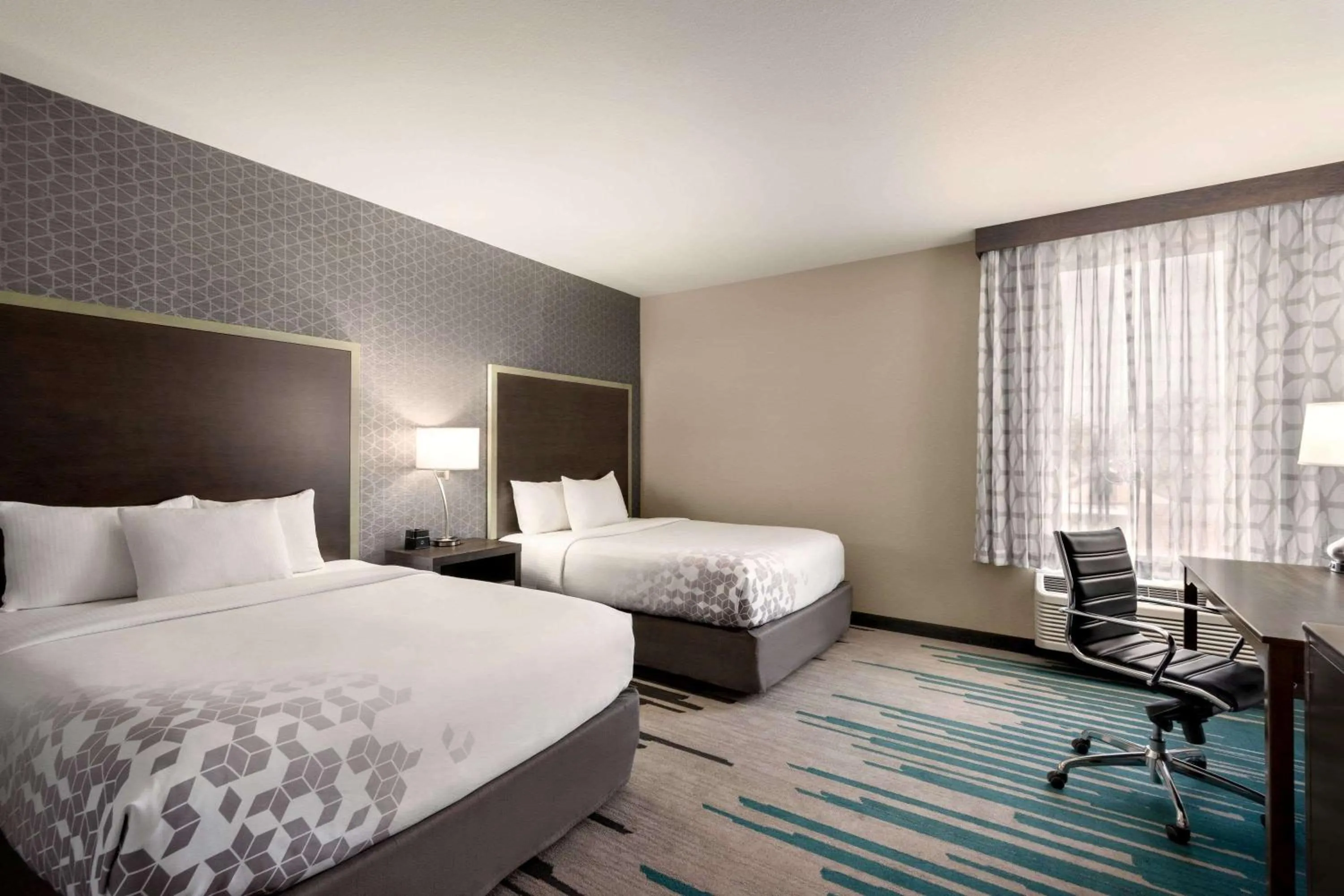 Photo of the whole room, Bed in La Quinta by Wyndham Clovis CA