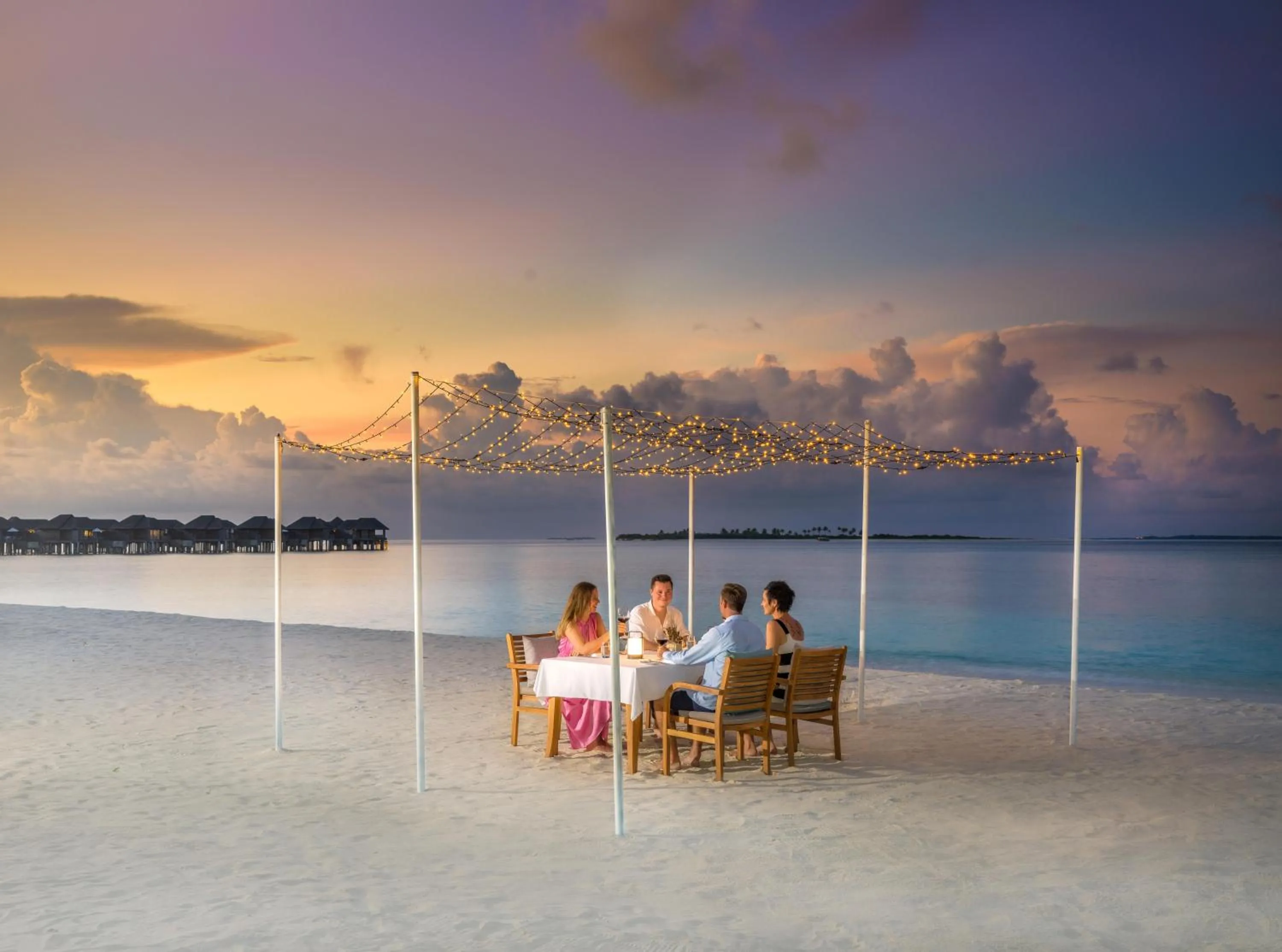 People in JA Manafaru, The Real Maldives - Complimentary Seaplane for 7 nights and more - Stay period until 23 Dec 2025