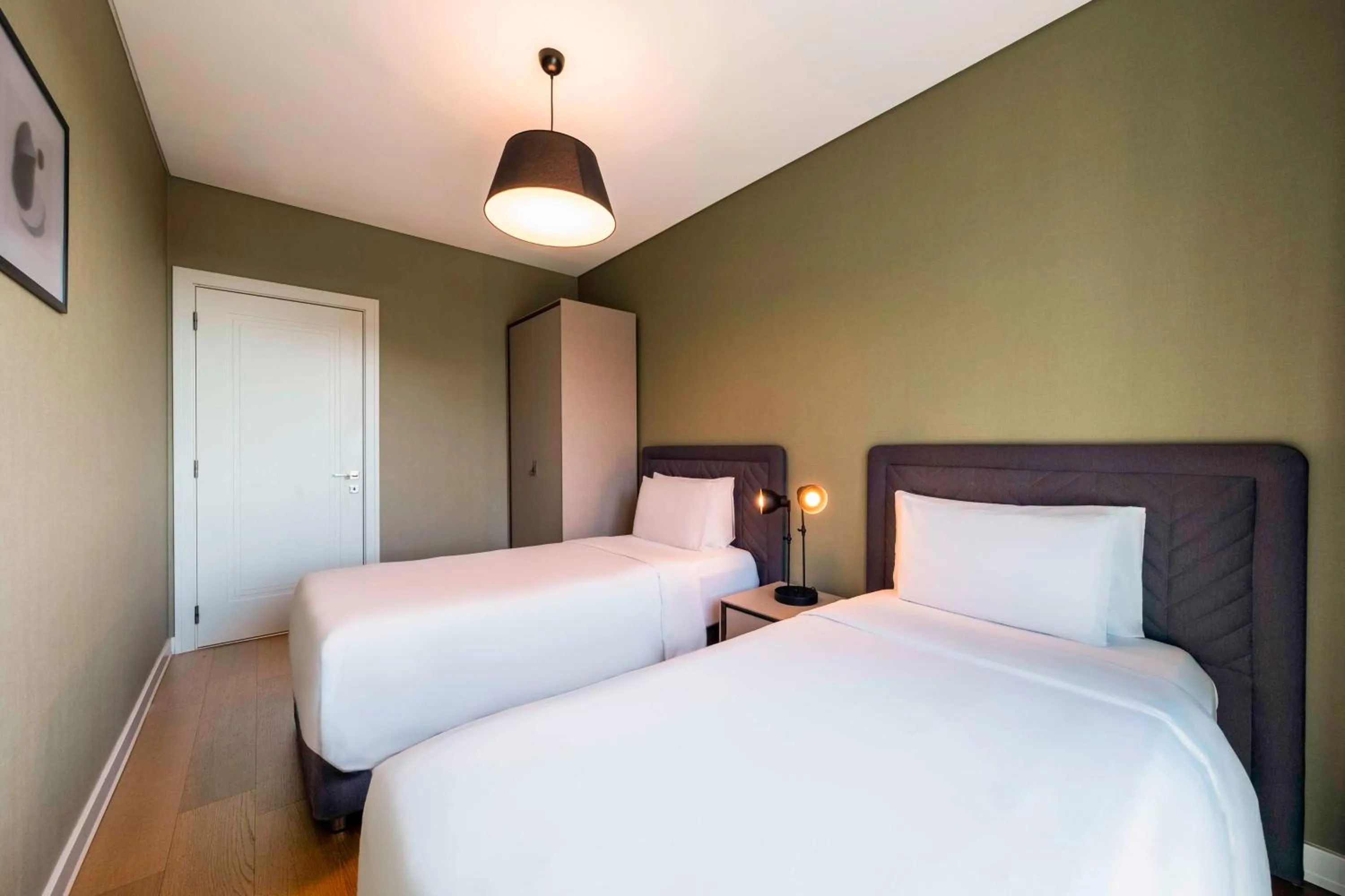 Photo of the whole room, Bed in Radisson Residences Vadistanbul