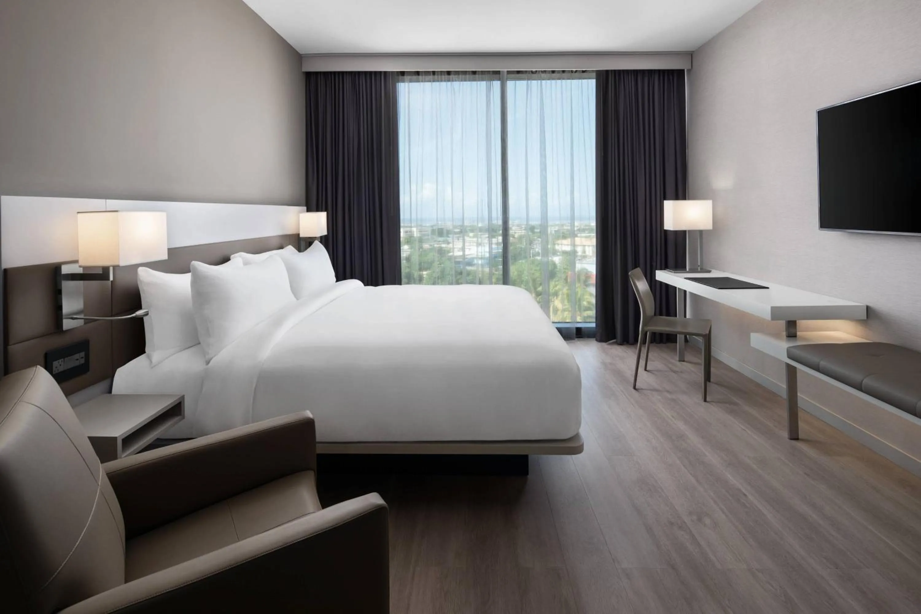 Photo of the whole room, Bed in AC Hotel by Marriott Kingston, Jamaica