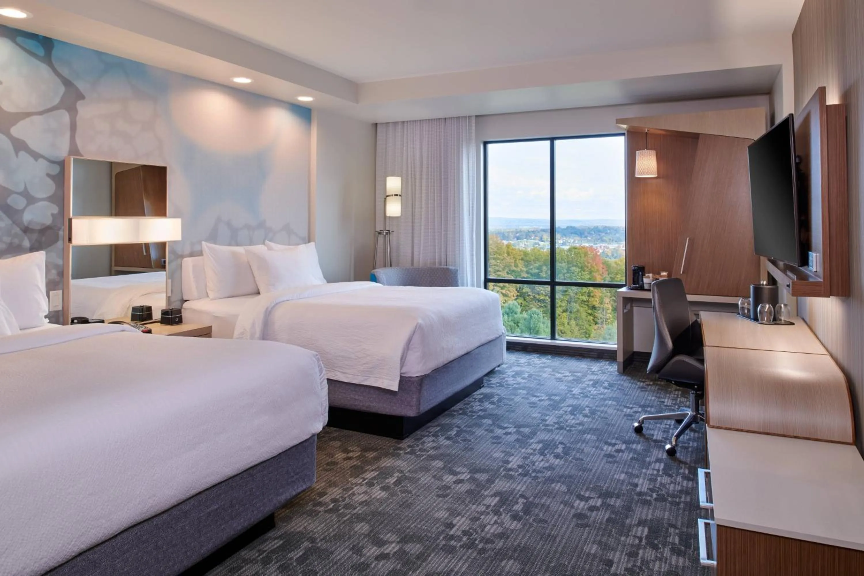 Photo of the whole room, Bed in Courtyard by Marriott Petoskey at Victories Square