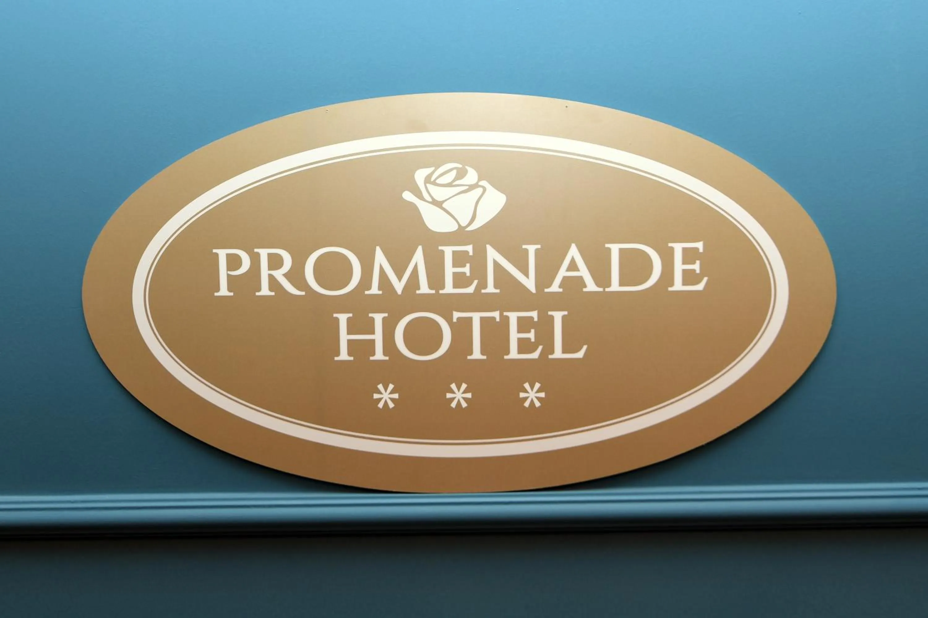 Property logo or sign in Promenade Hotel