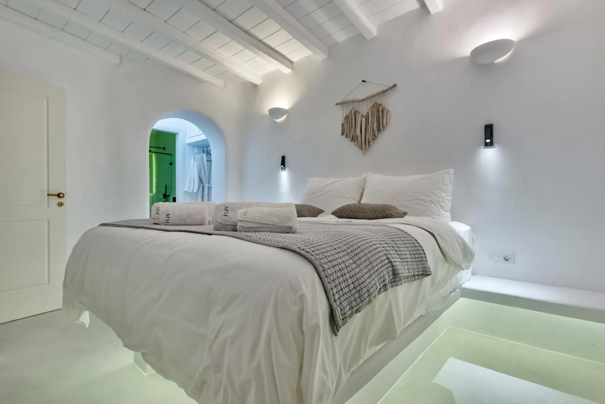 Bed in Mykonian Mews Luxury Suites