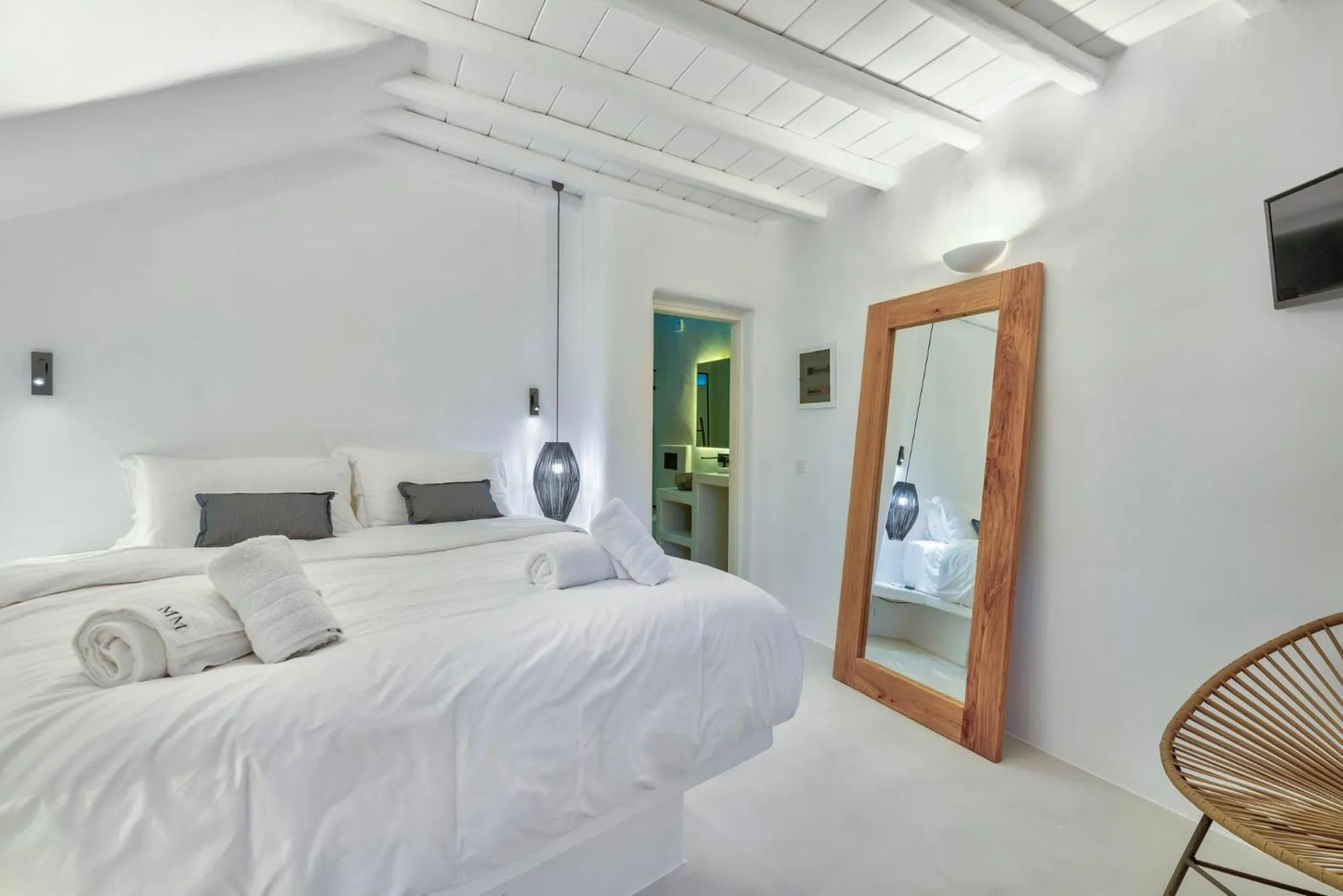 Bed in Mykonian Mews Luxury Suites