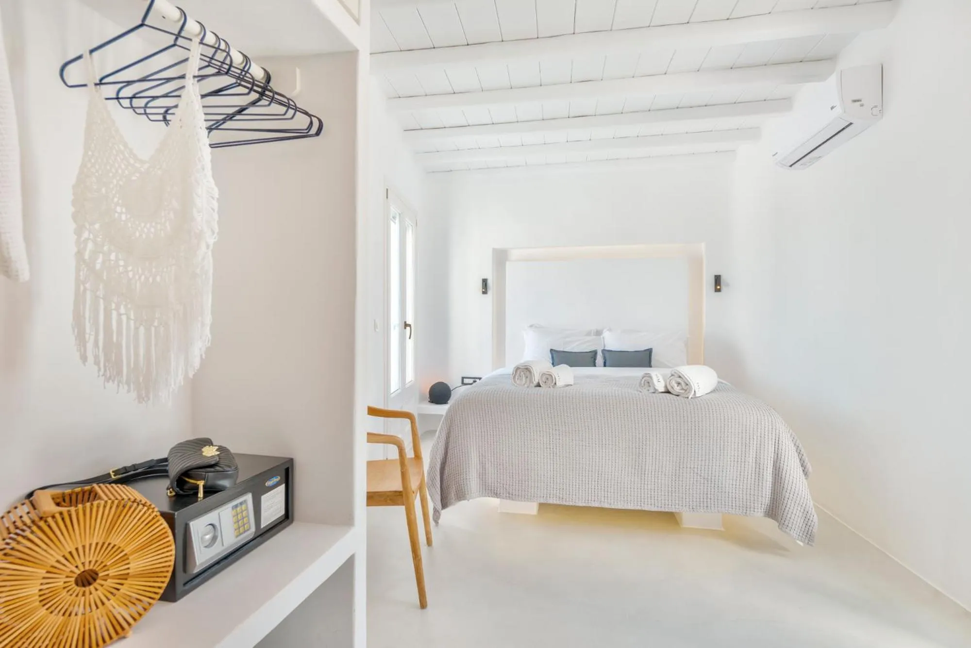 Bed in Mykonian Mews Luxury Suites