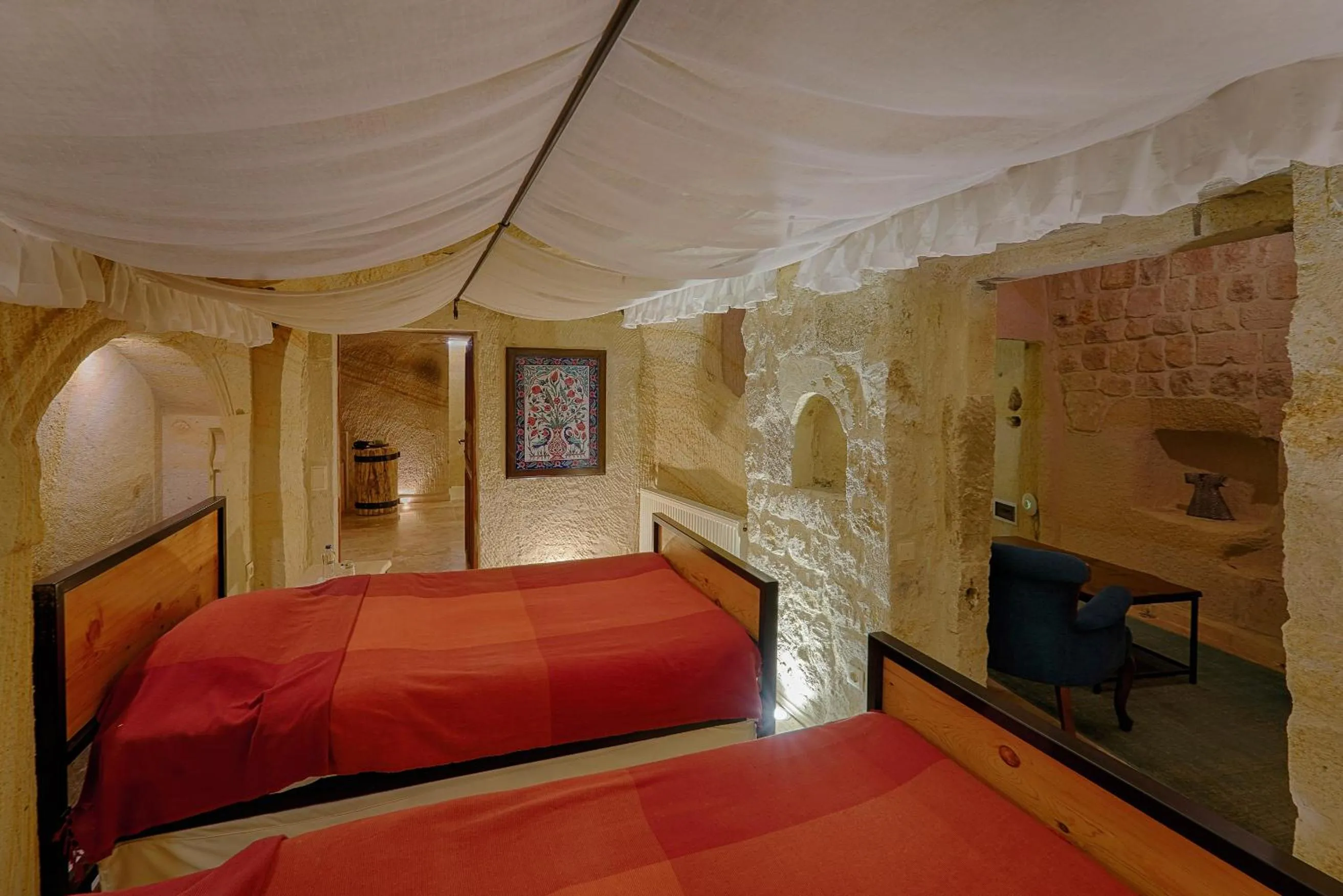 Bed in Taru Cave Suites