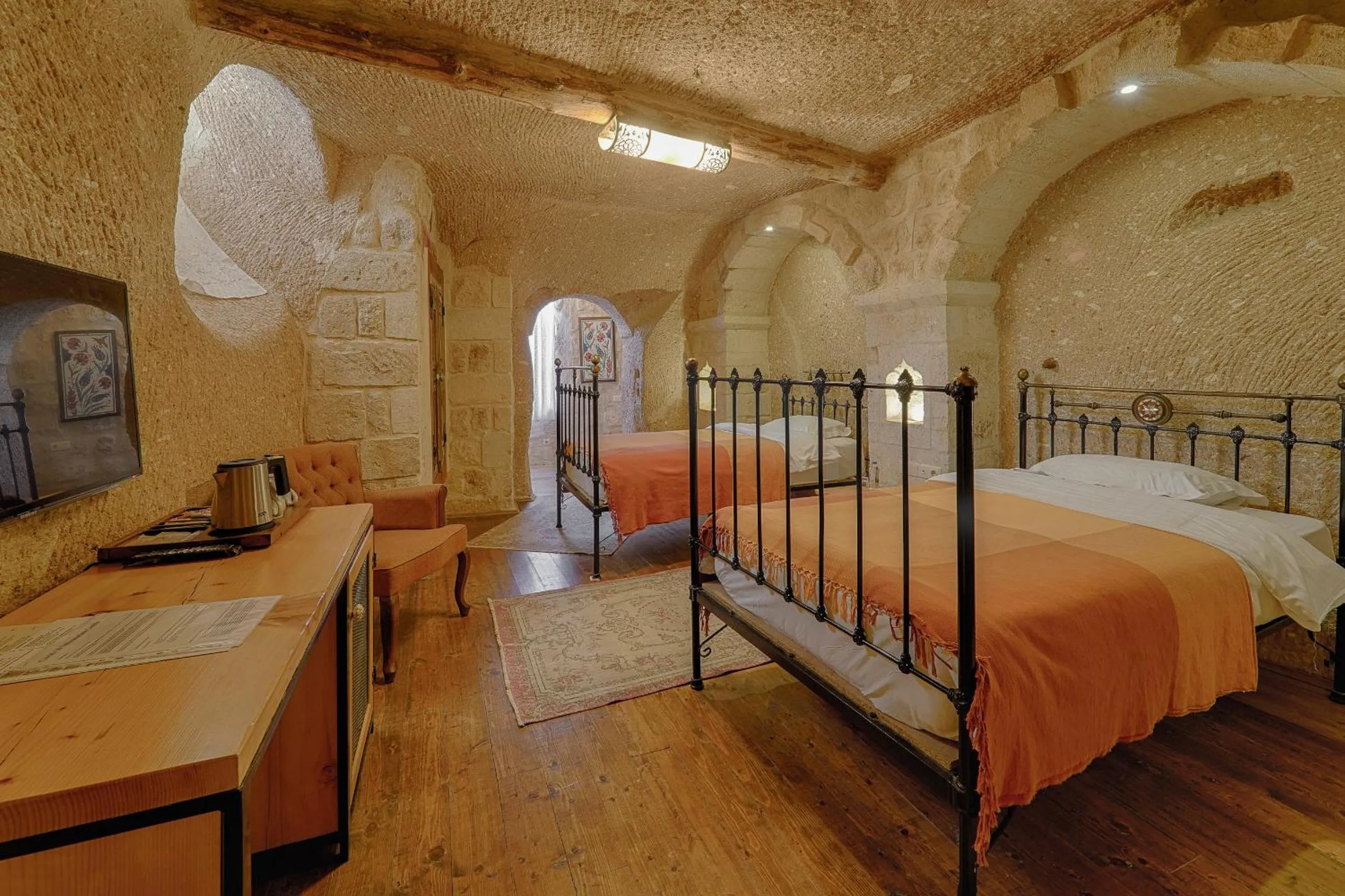 Bed in Taru Cave Suites