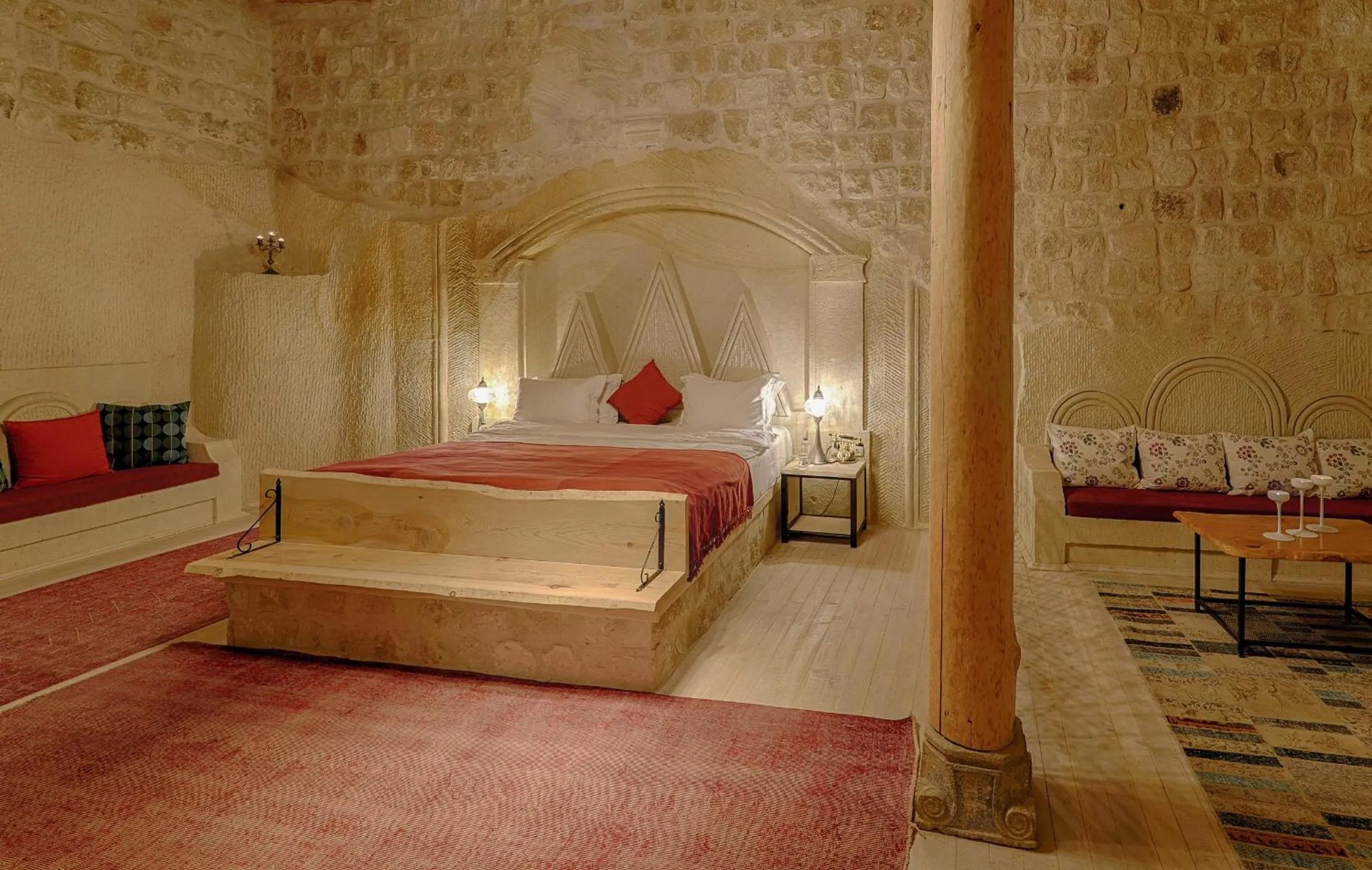 Bed in Taru Cave Suites